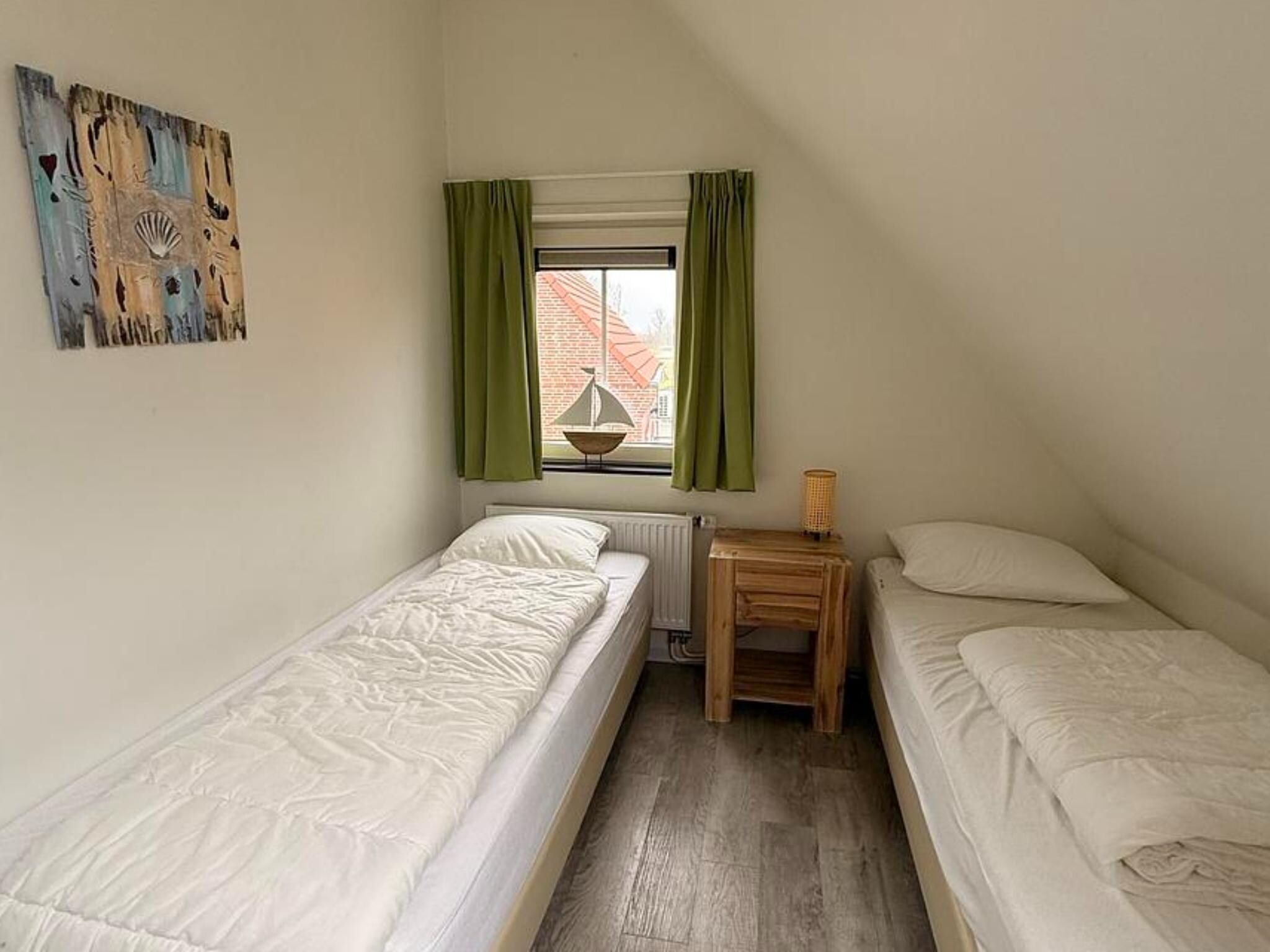 Een slaapkamer van Landgoed de Lente 40 Sneeuwklokje Breskens in Breskens