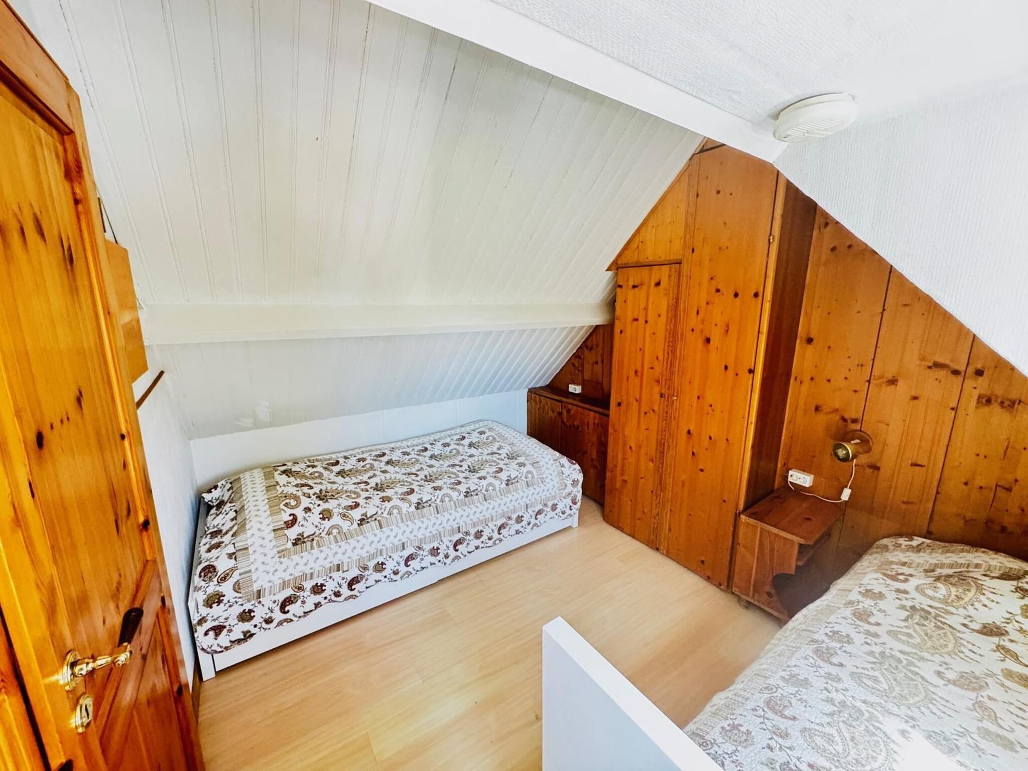 Een slaapkamer van Nummer Één 26a Hoofdplaat in Hoofdplaat