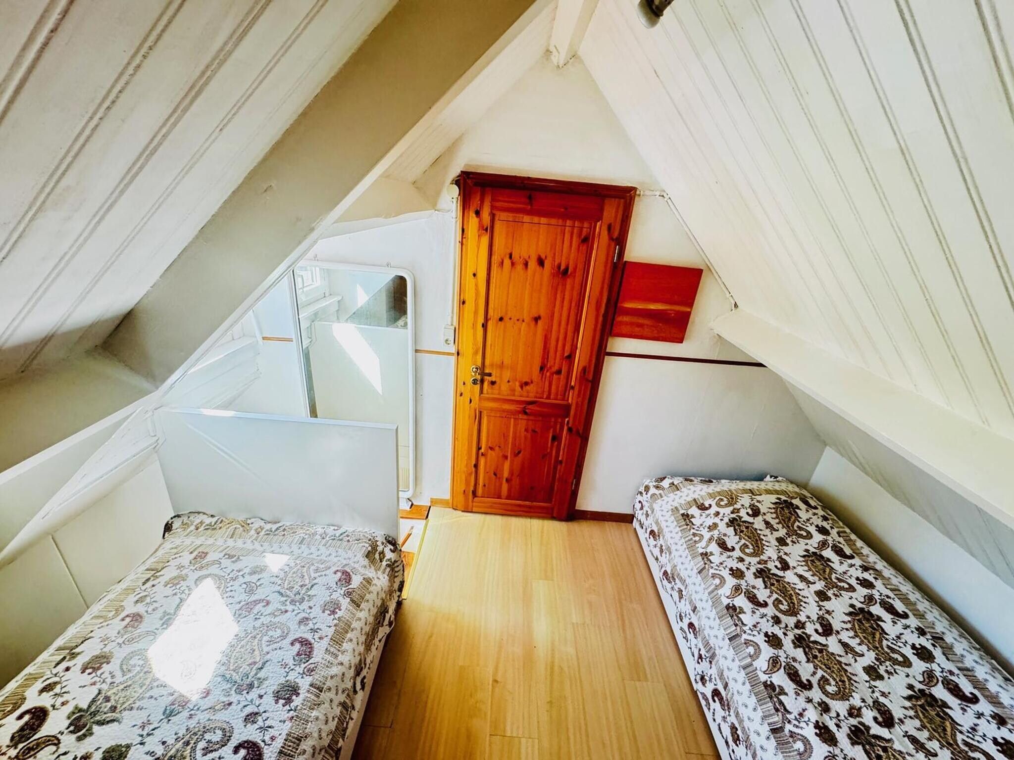 Een slaapkamer van Nummer Één 26a Hoofdplaat in Hoofdplaat