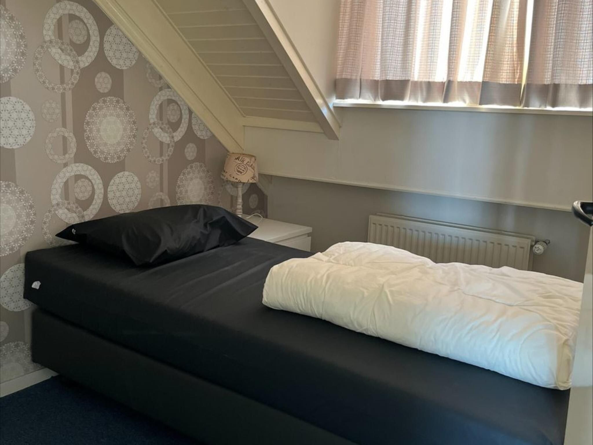 Een slaapkamer van 2e Zandstraat 9 Breskens in Breskens