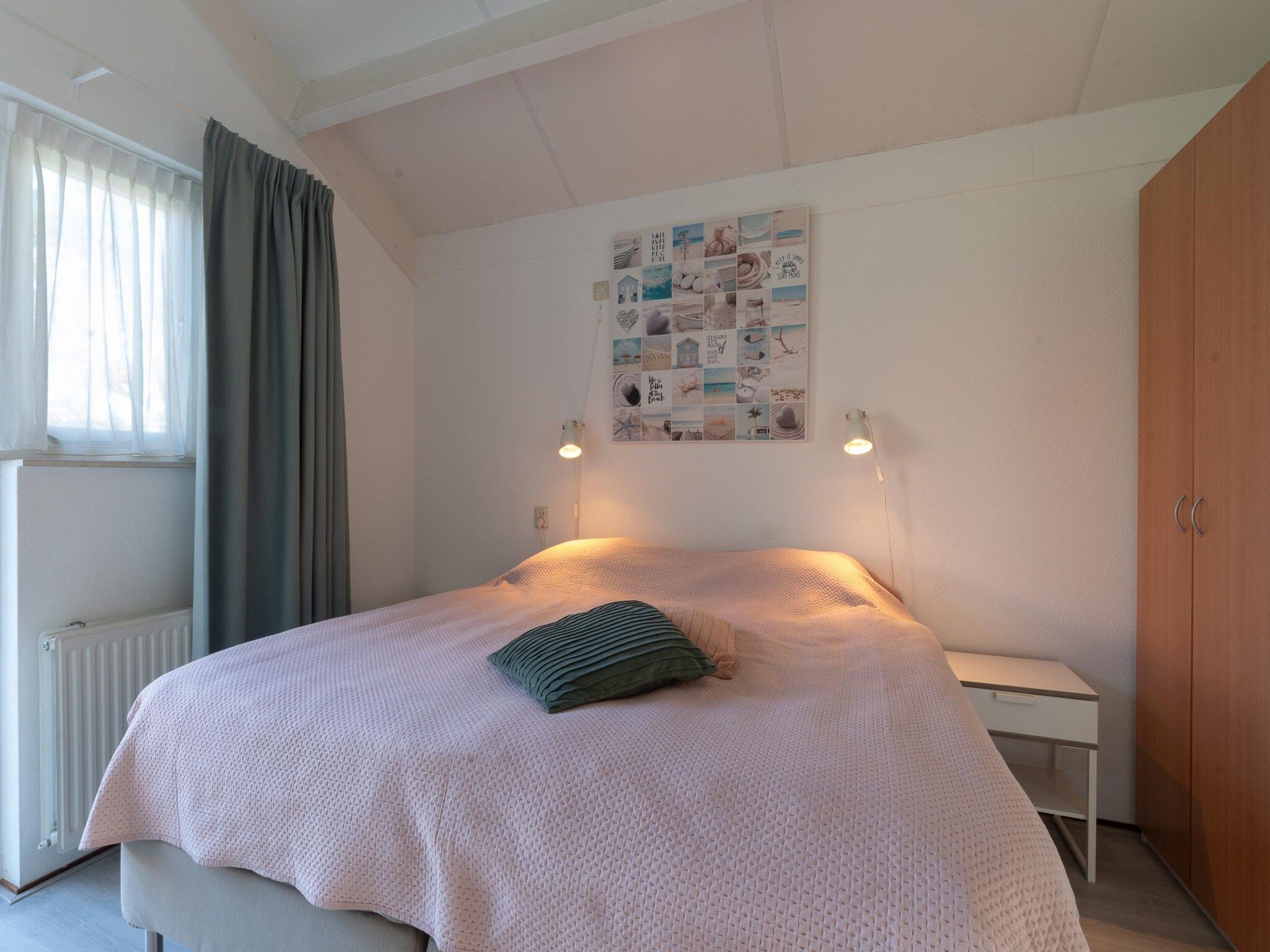 Een slaapkamer van Villapark De Oesterbaai 31 in Wemeldinge