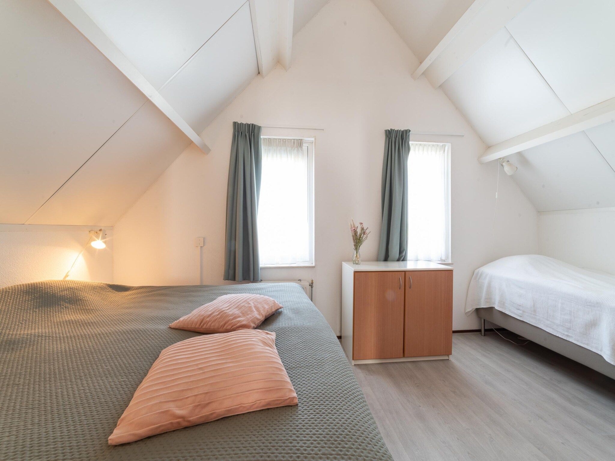 Een slaapkamer van Villapark De Oesterbaai 31 in Wemeldinge