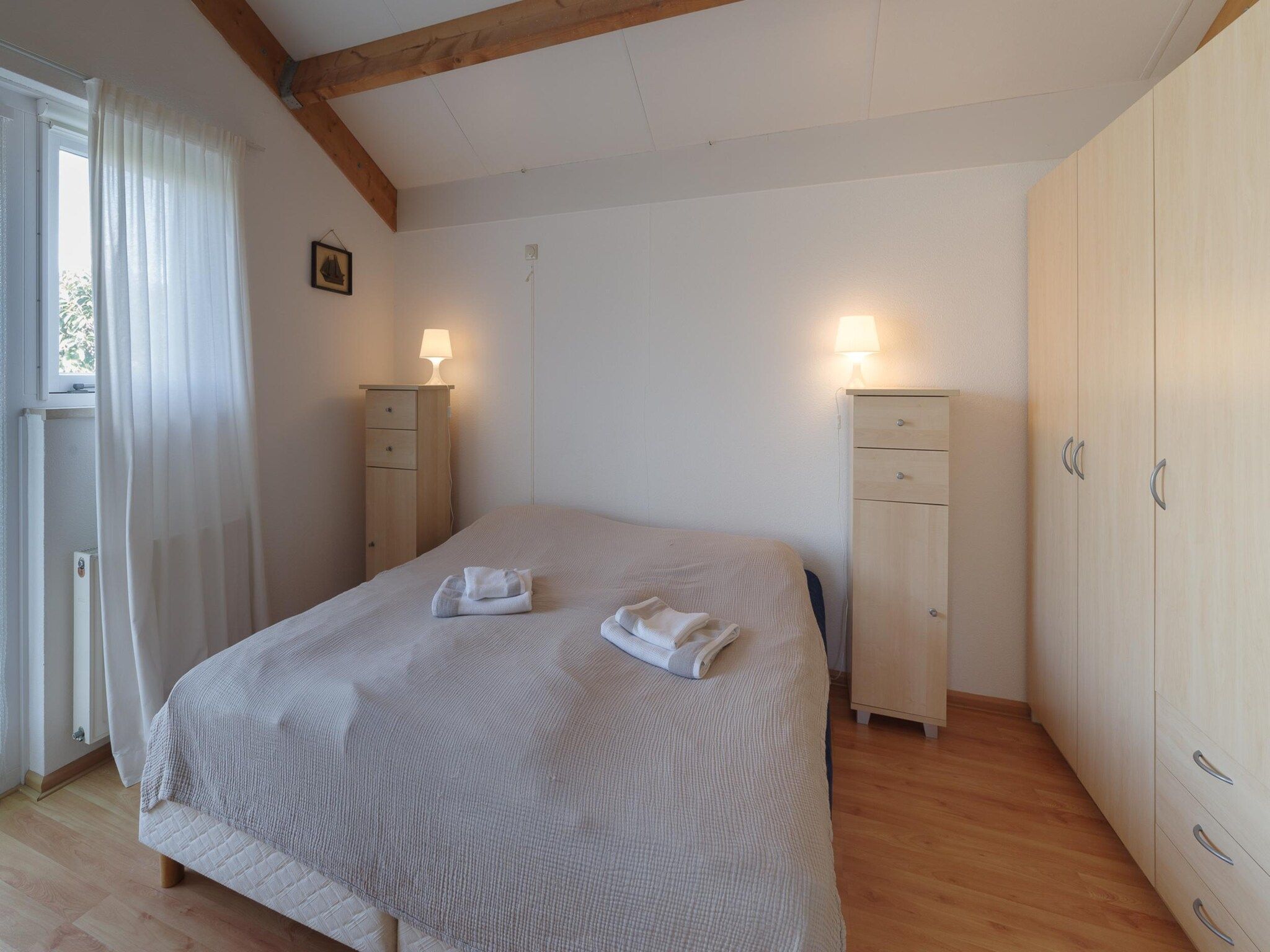 Een slaapkamer van Villapark De Oesterbaai 96 in Wemeldinge