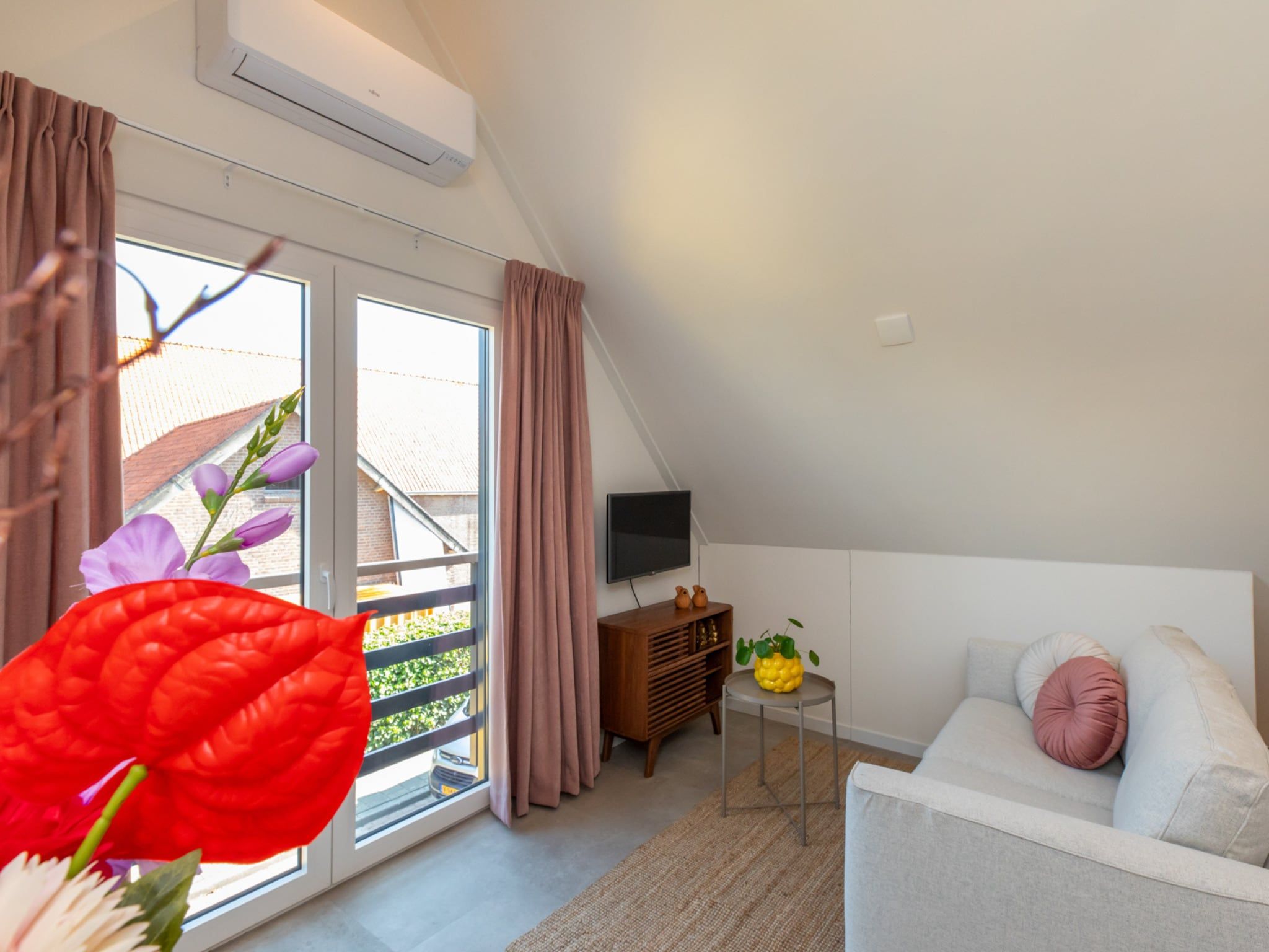 De woonkamer van Appartement 'Bed by Al' - Hoofdstraat 16 a  Kortgene in kortgene