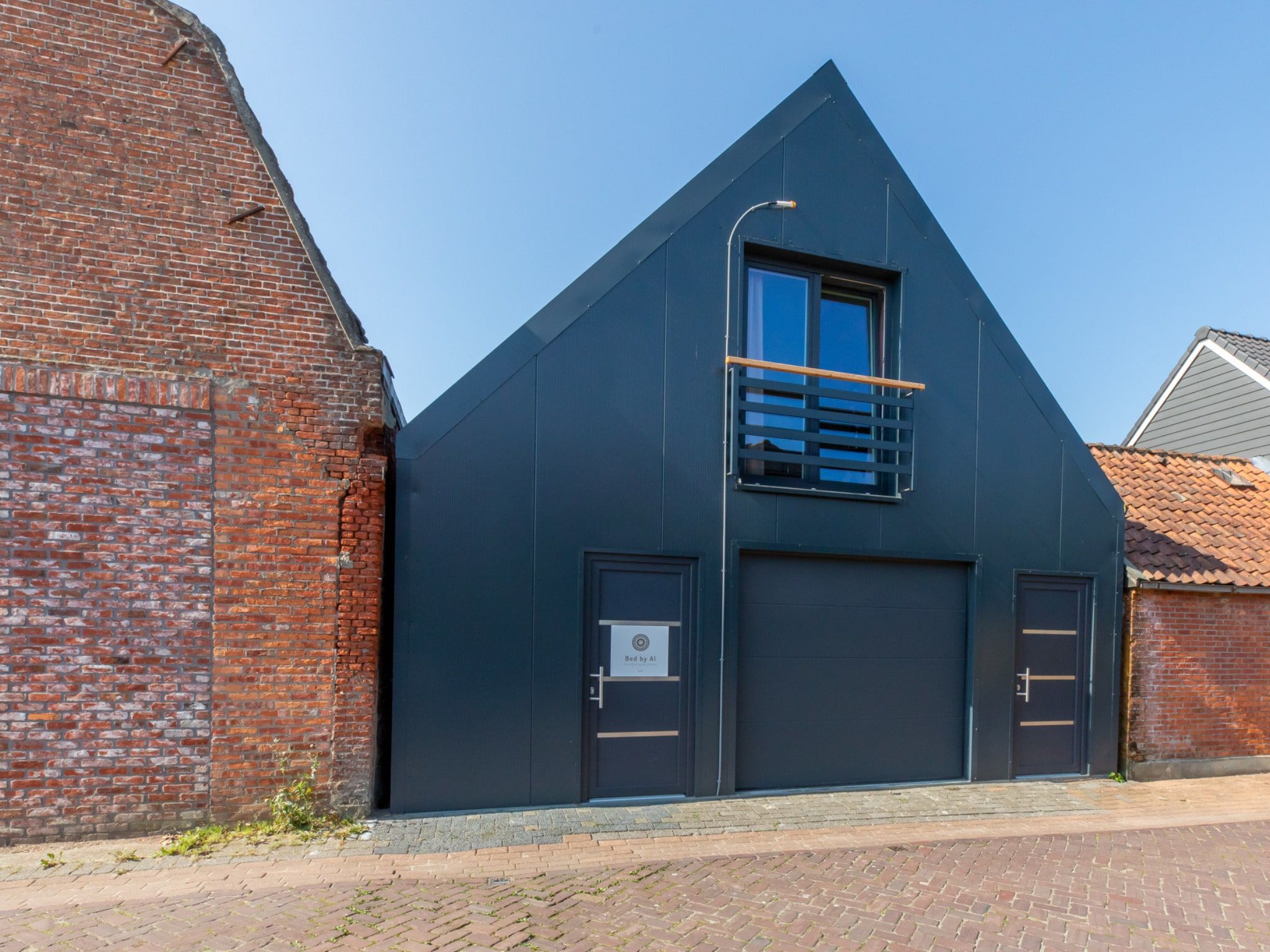 De buitenkant van Appartement 'Bed by Al' - Hoofdstraat 16 a  Kortgene in kortgene
