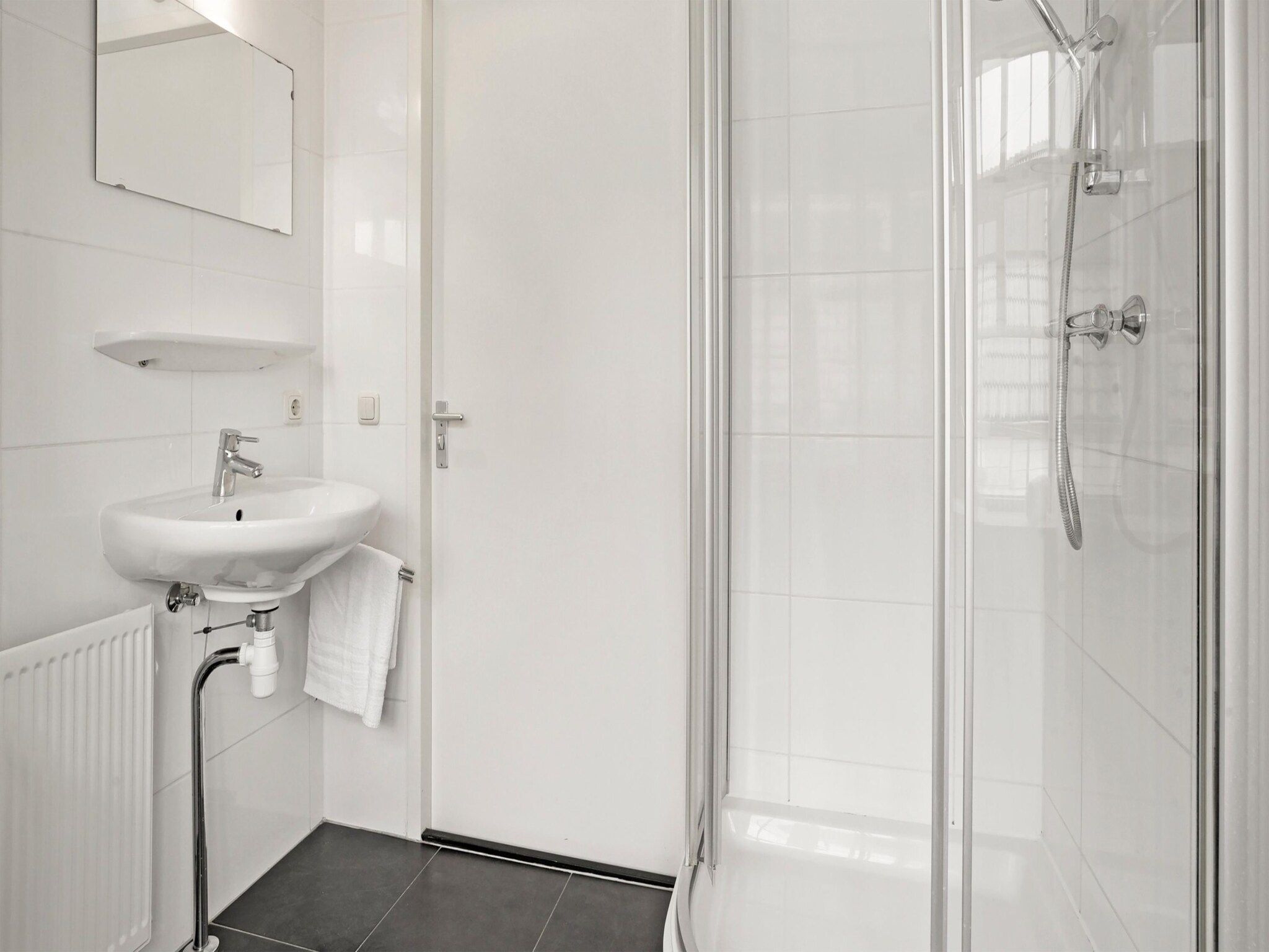 De badkamer van 233 in Simonshaven