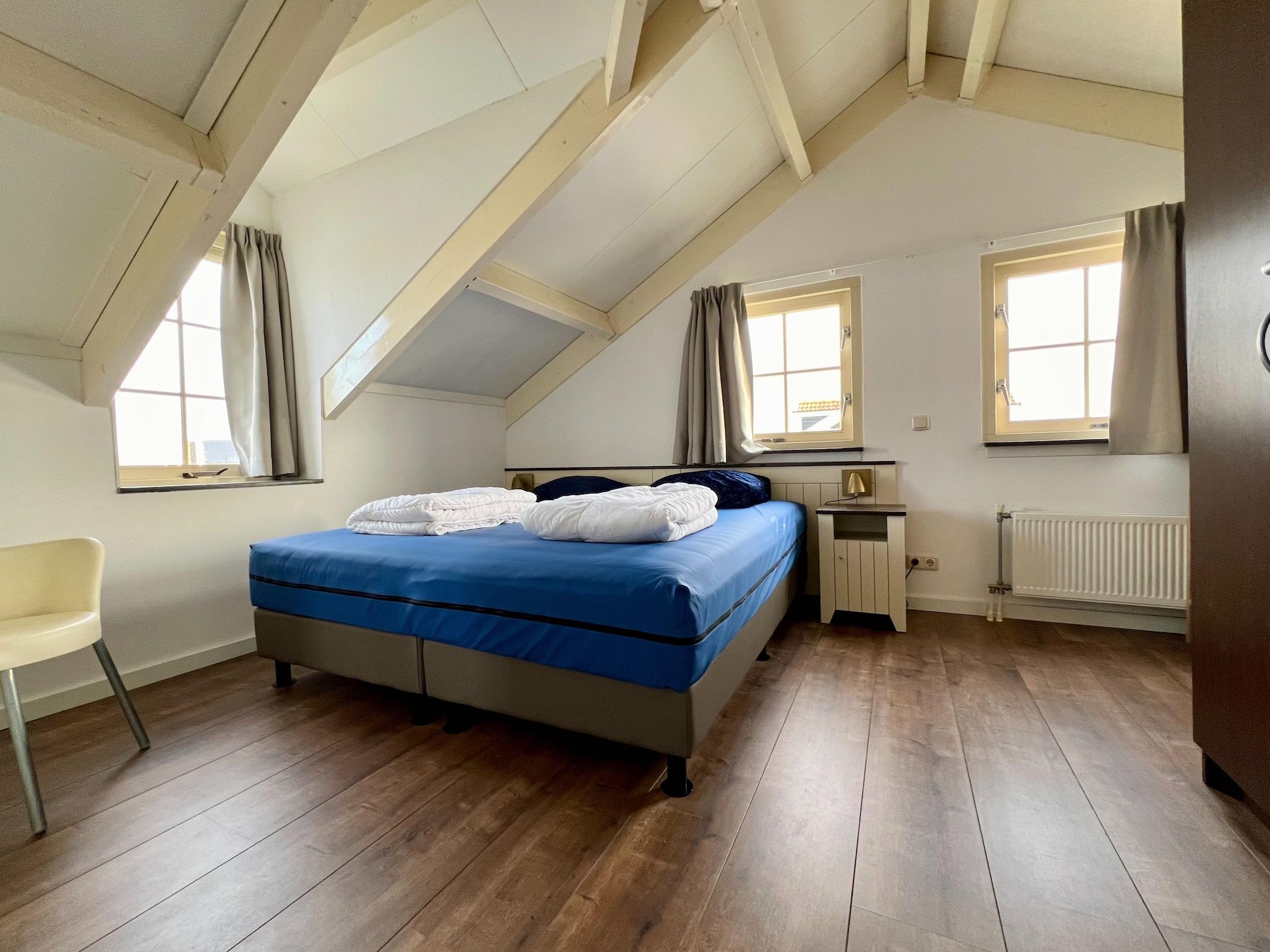 Een slaapkamer van 233 in Simonshaven