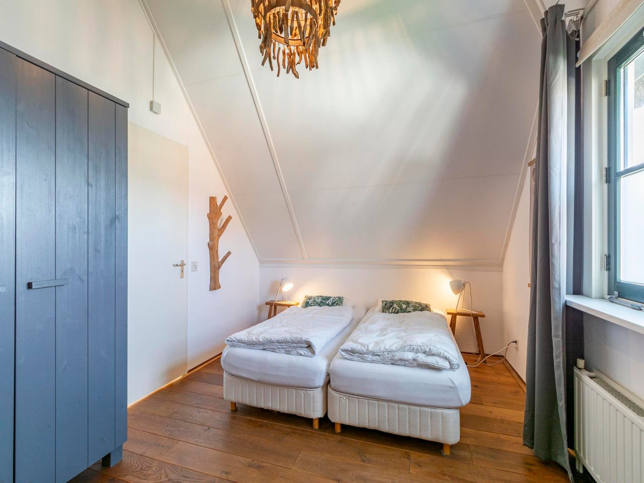 Een slaapkamer van buitenplaats 134 in Callantsoog