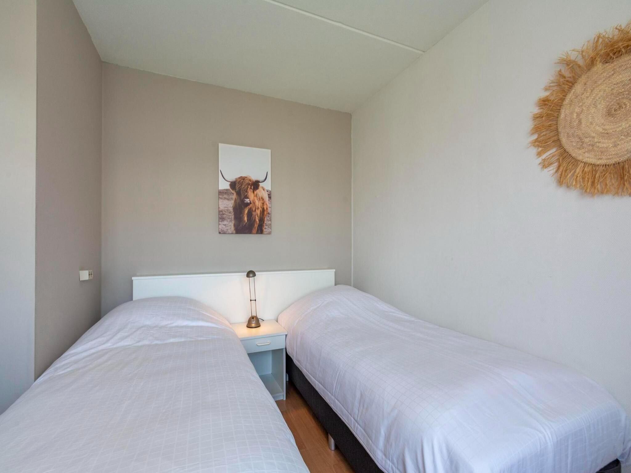 Een slaapkamer van Beach Appartement 28 in Callantsoog