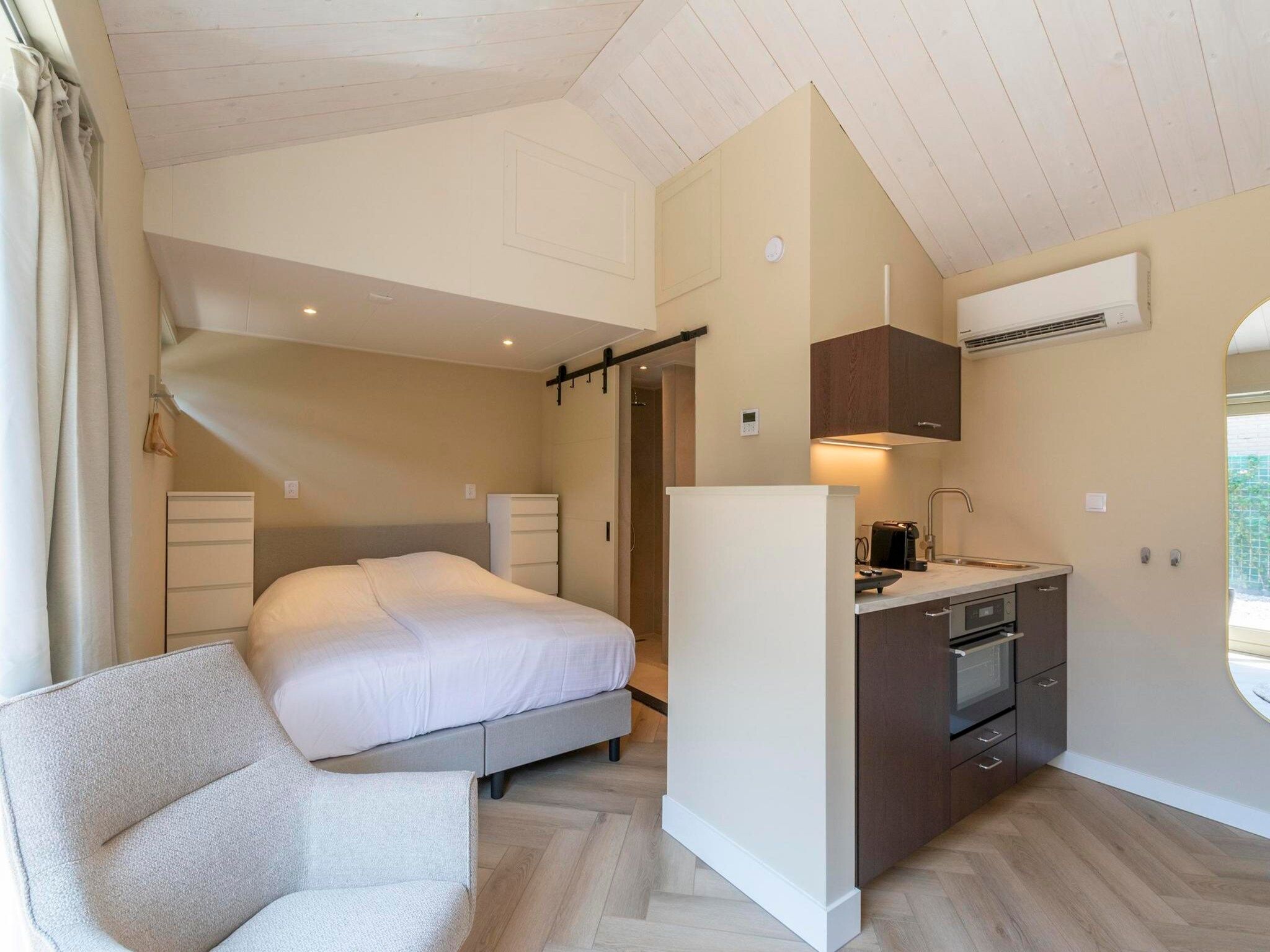 Een slaapkamer van Strandsuites 2 agendas in Callantsoog