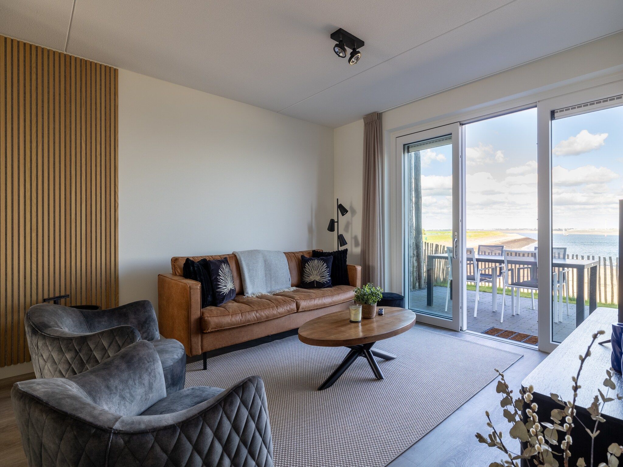 De woonkamer van Appartement Vista Maris "Charlotte's Parel" - Havenweg 8-44  Sint-Annaland in Sint-Annaland