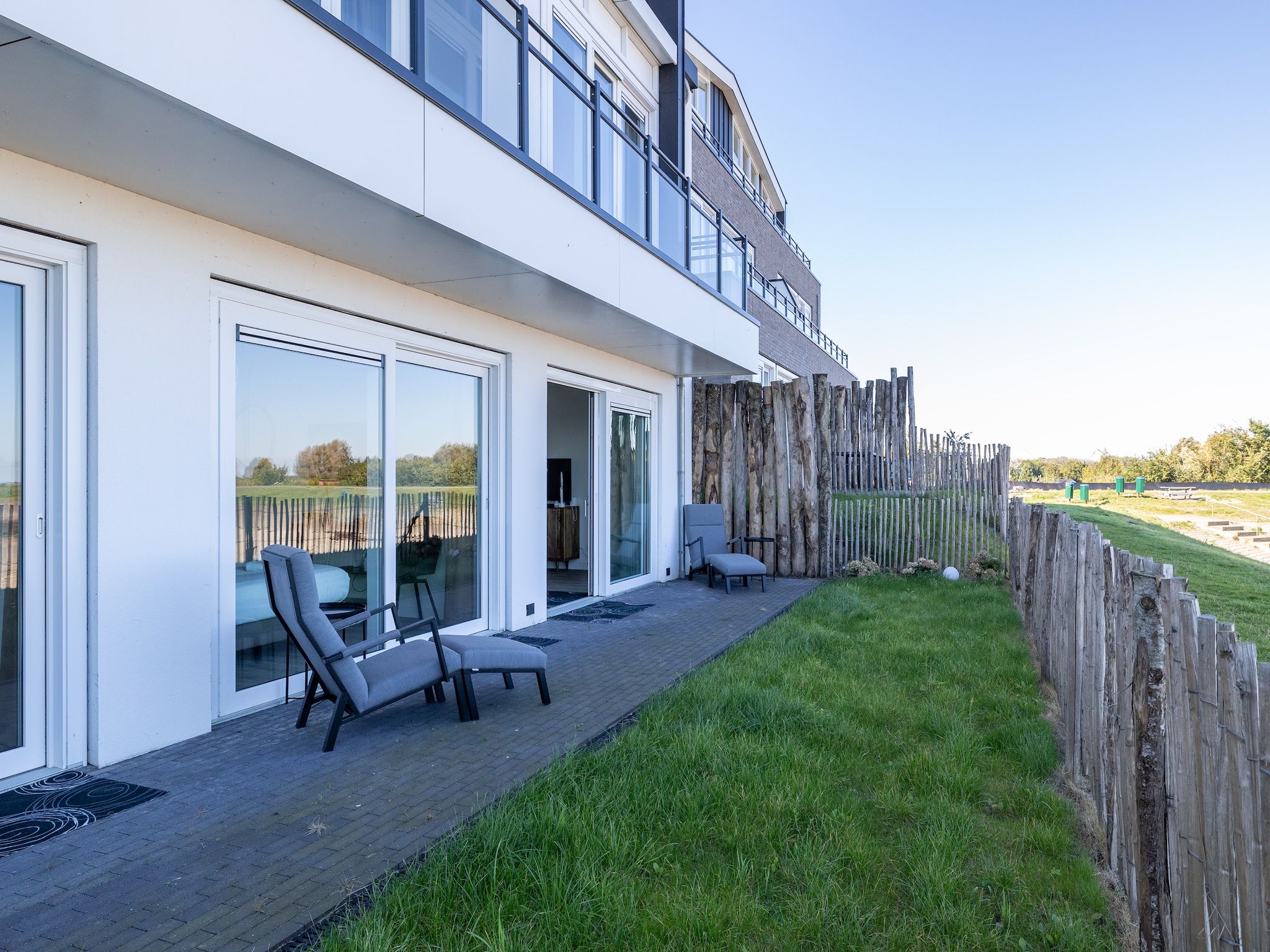 De tuin van Luxe appartement Vista Maris - Havenweg 8-34  Sint-Annaland Oosterschelde in Sint-Annaland