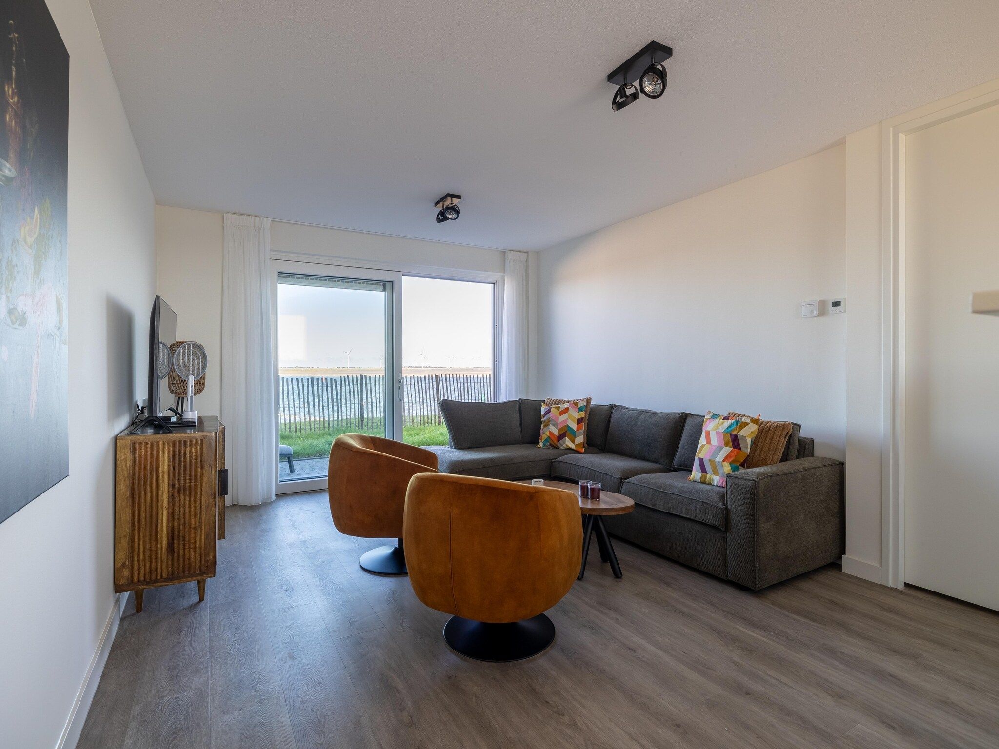 De woonkamer van Luxe appartement Vista Maris - Havenweg 8-34  Sint-Annaland Oosterschelde in Sint-Annaland
