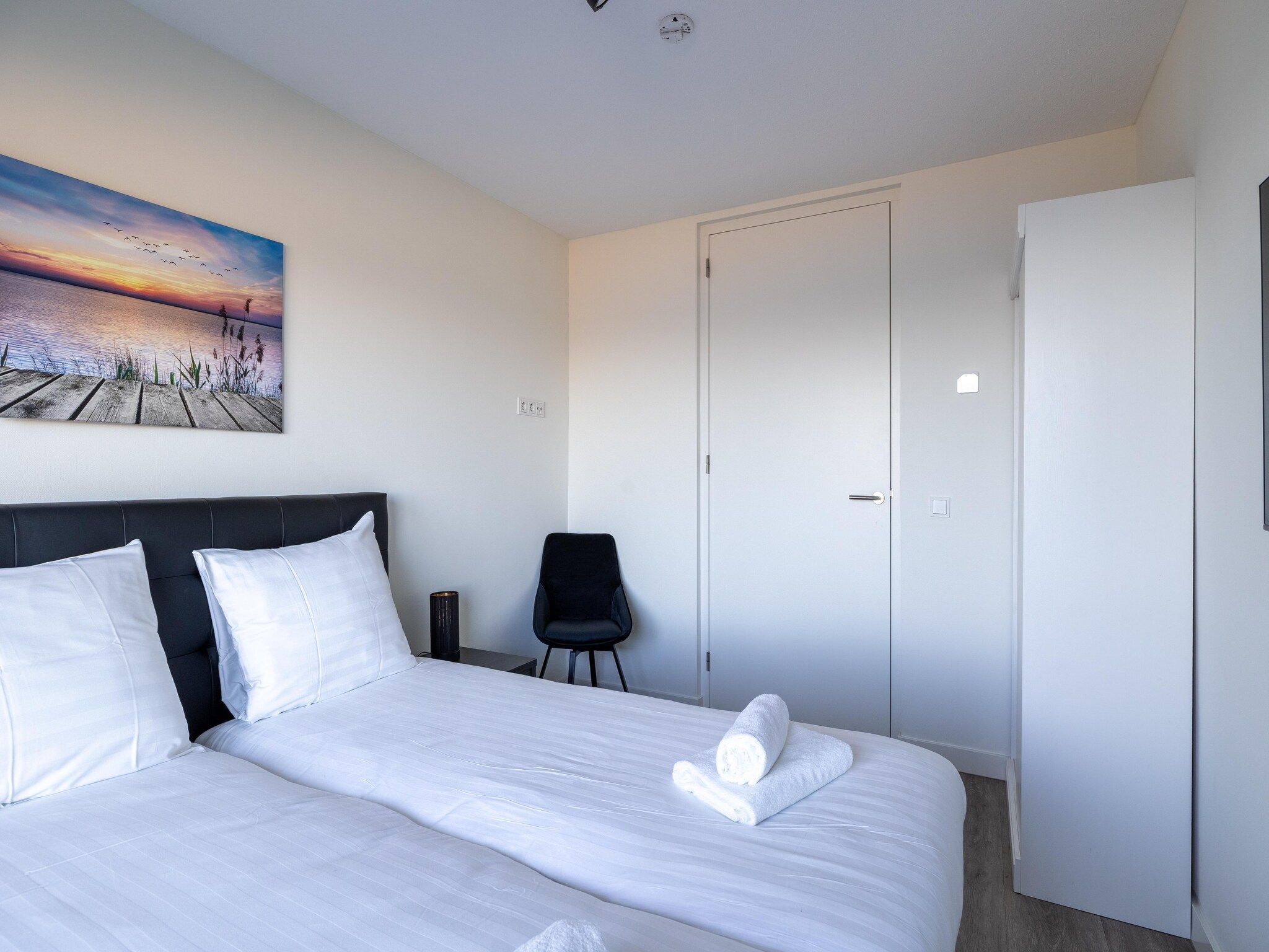 Een slaapkamer van Luxe appartement Vista Maris - Havenweg 8-34  Sint-Annaland Oosterschelde in Sint-Annaland