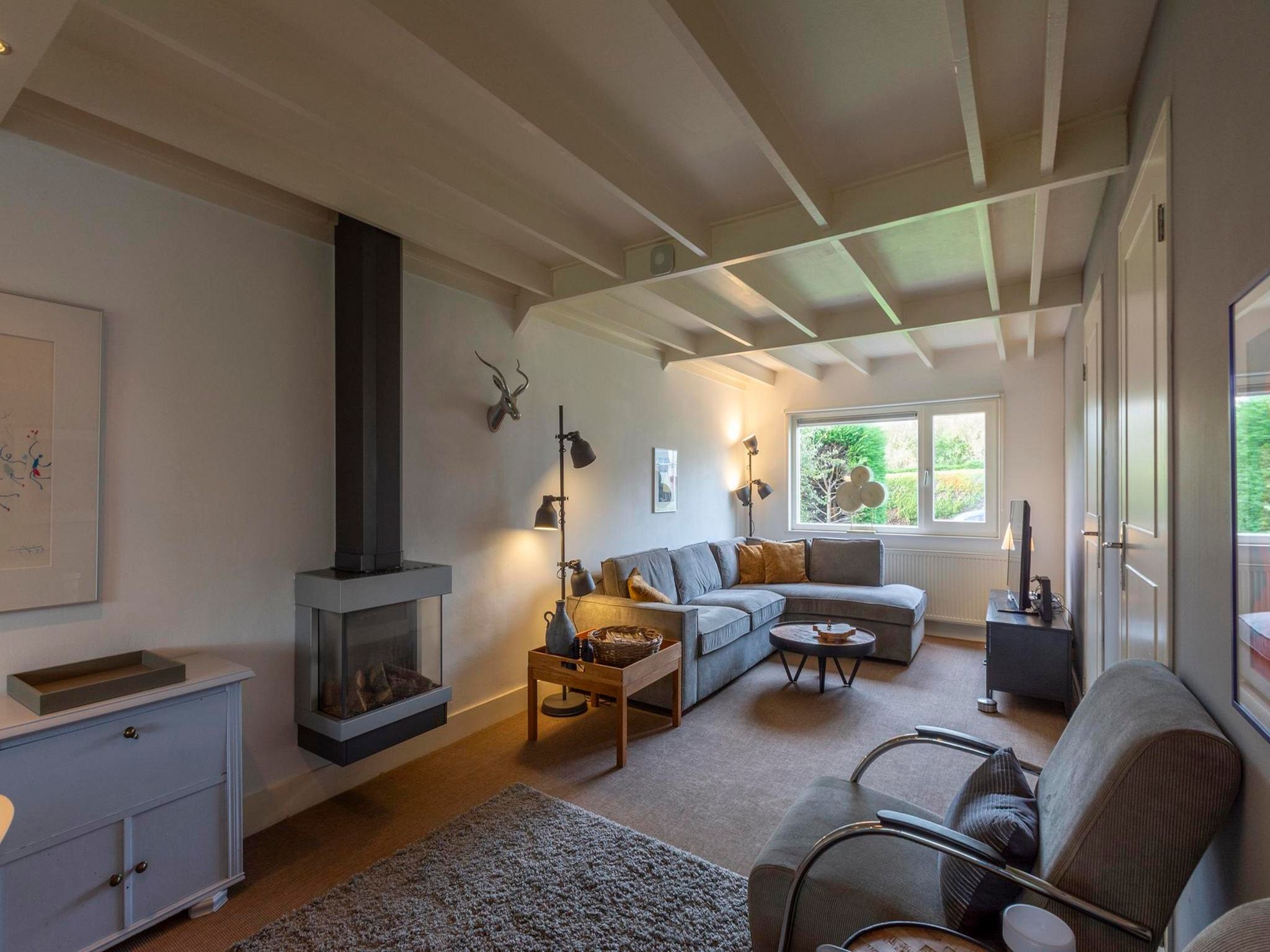 De woonkamer van Belkmerduinen 2 in Sint Maartenszee