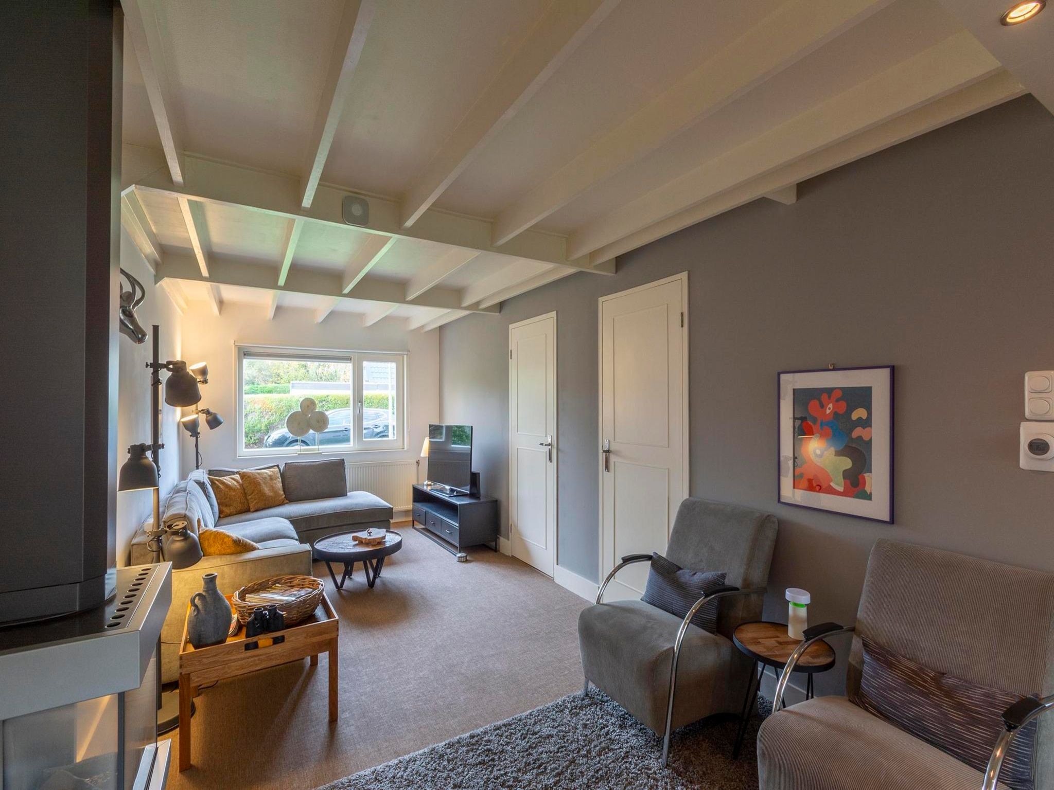 De woonkamer van Belkmerduinen 2 in Sint Maartenszee