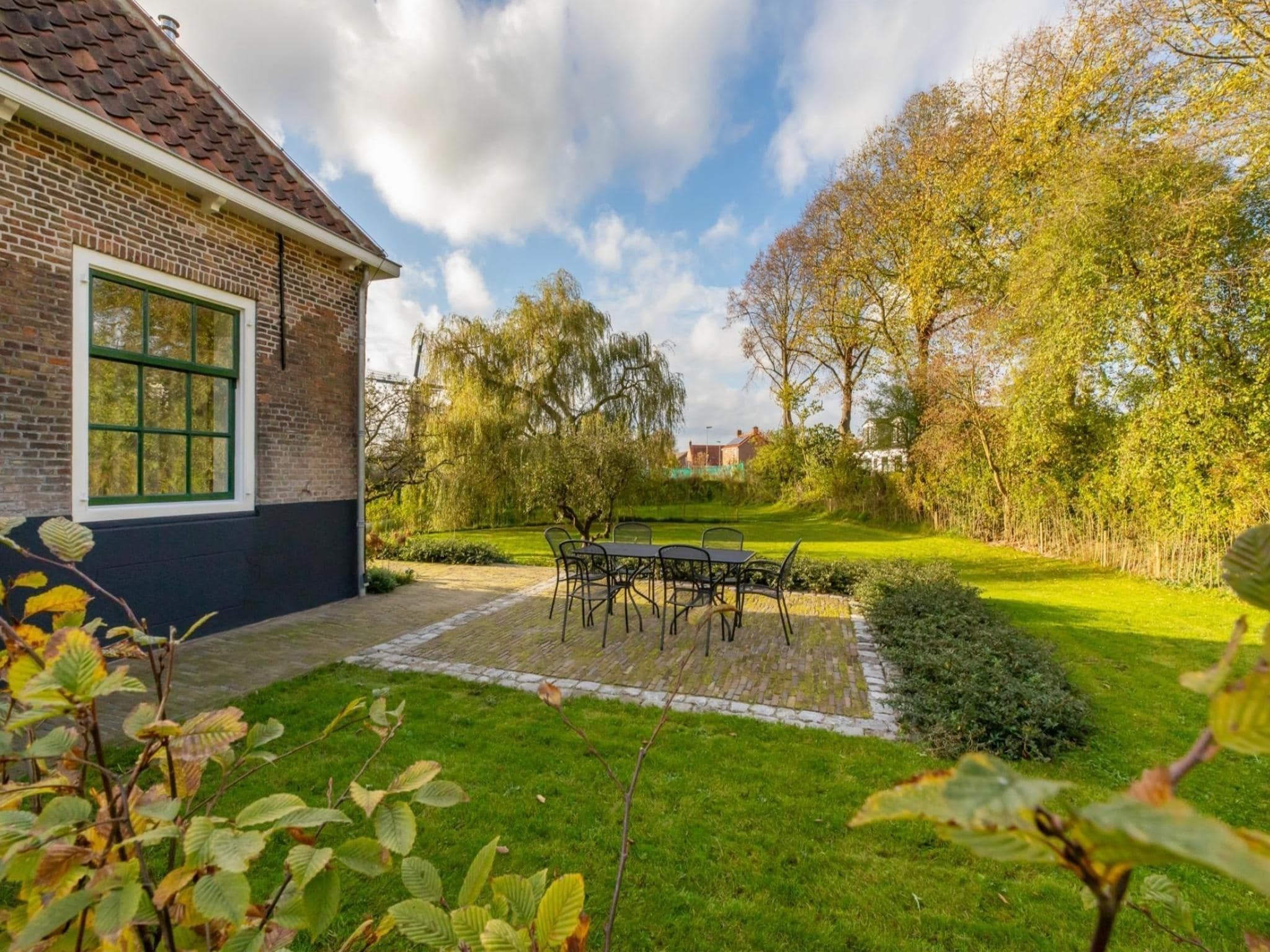 De tuin van Vakantiehuis 'Boerderij Molenhof' - Stationsweg 5  Heinkenszand in Heinkenszand