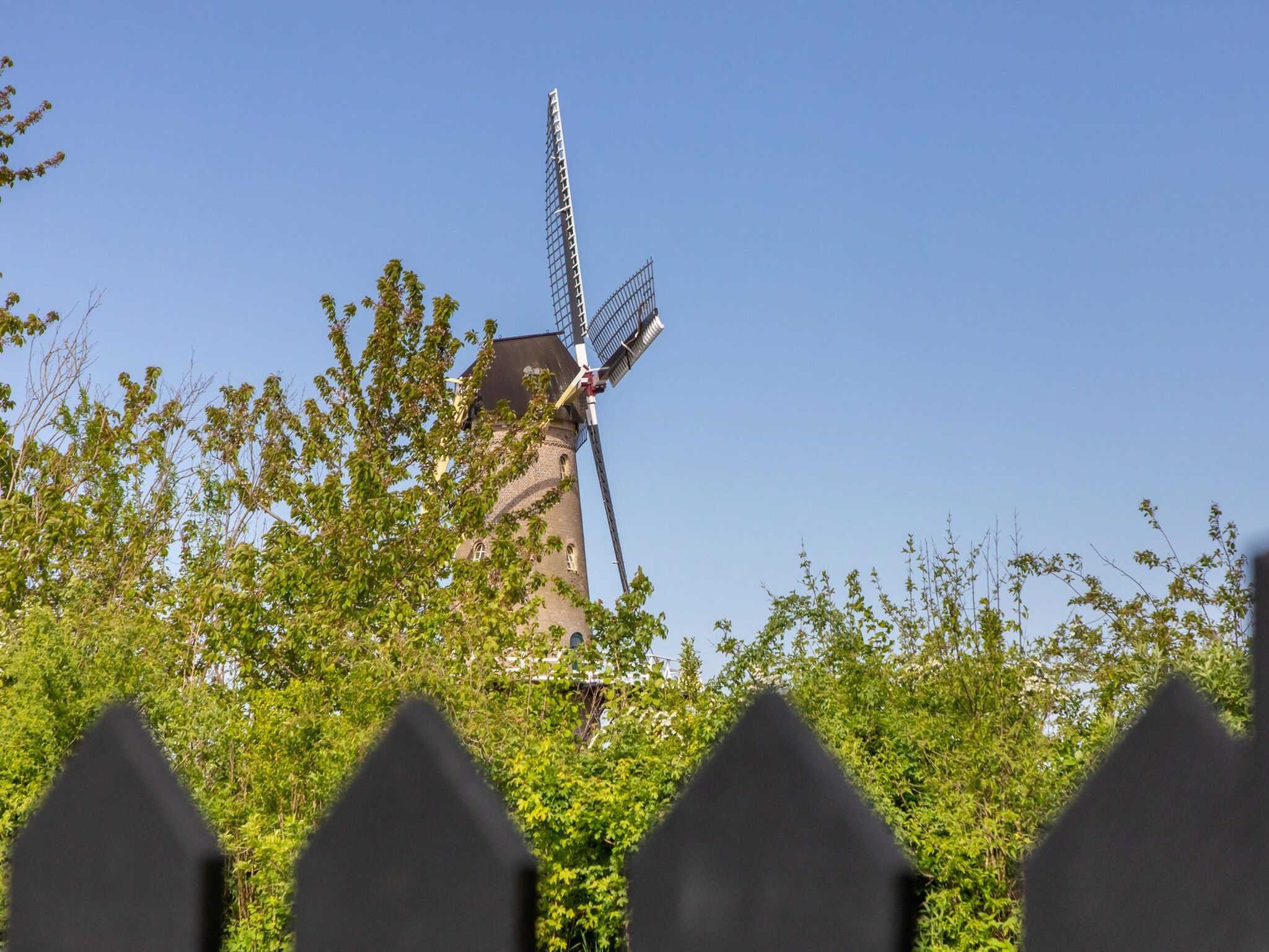 De buitenkant van Vakantiehuis 'Boerderij Molenhof' - Stationsweg 5  Heinkenszand in Heinkenszand