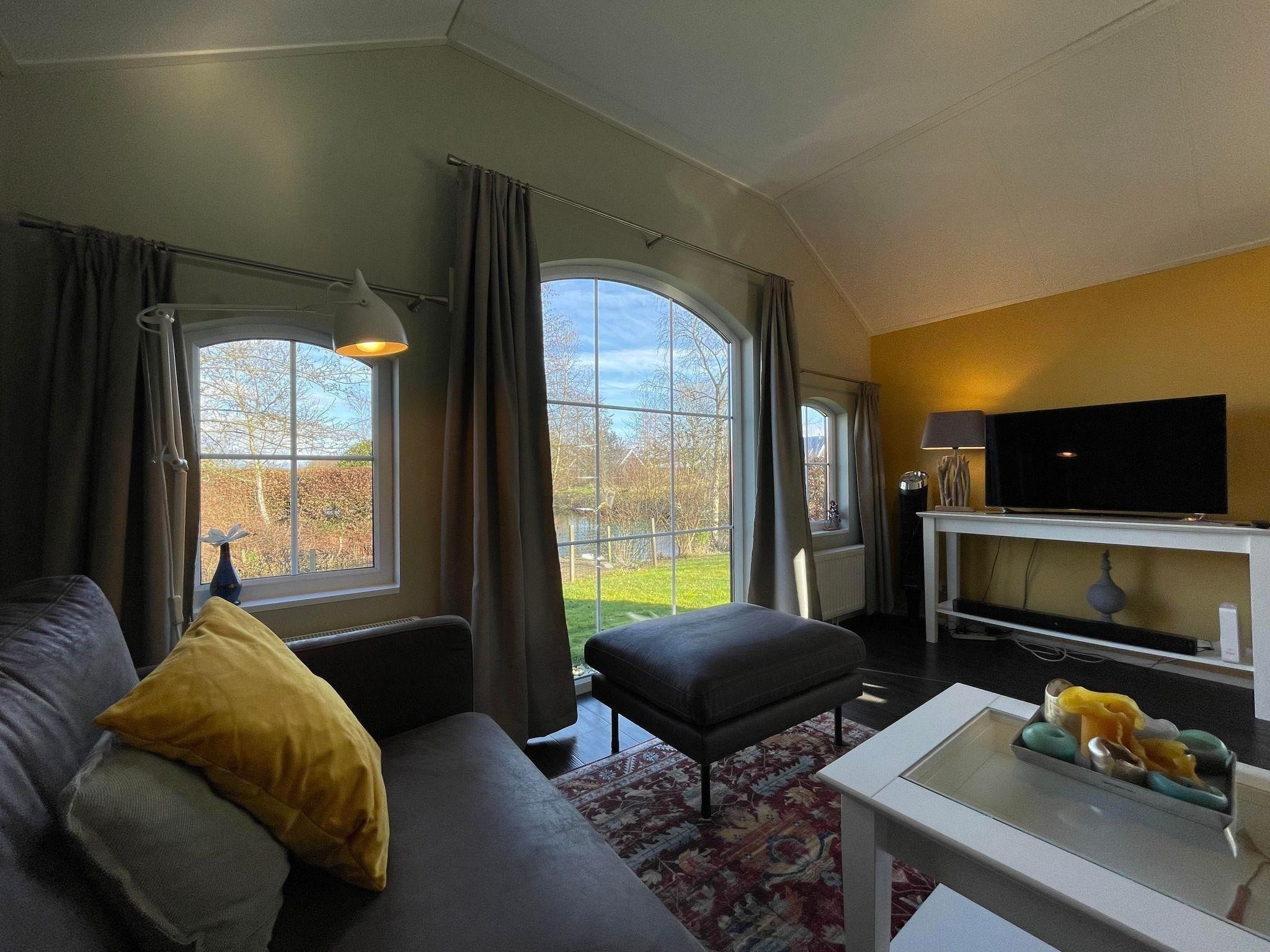 De woonkamer van Boerderijchalet in Sint Nicolaasga