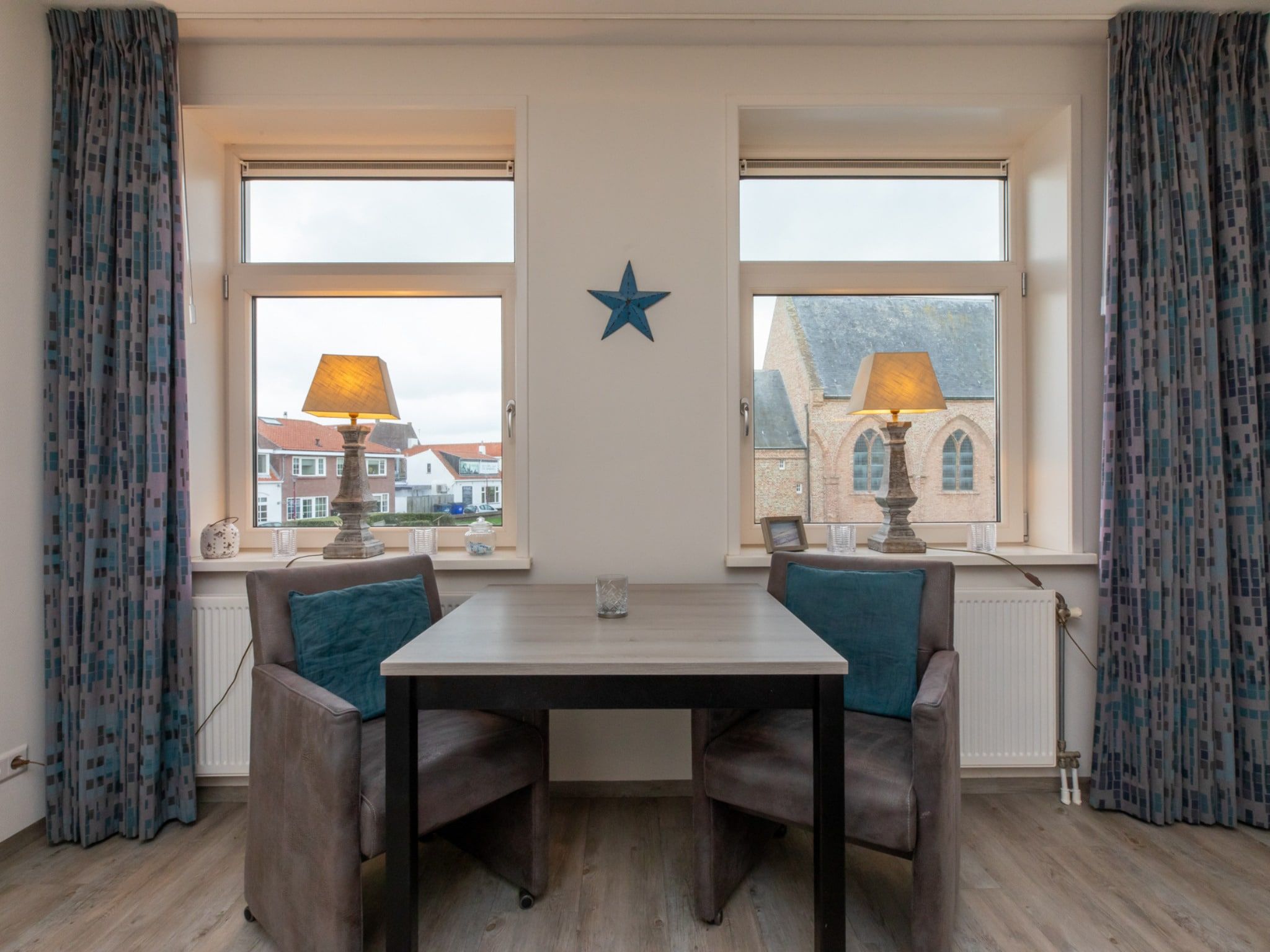 Het uitzicht vanaf Vakantiewoning 't Zoete Licht Residenz - Willibrordusplein 28 C  Zoutelande in Zoutelande
