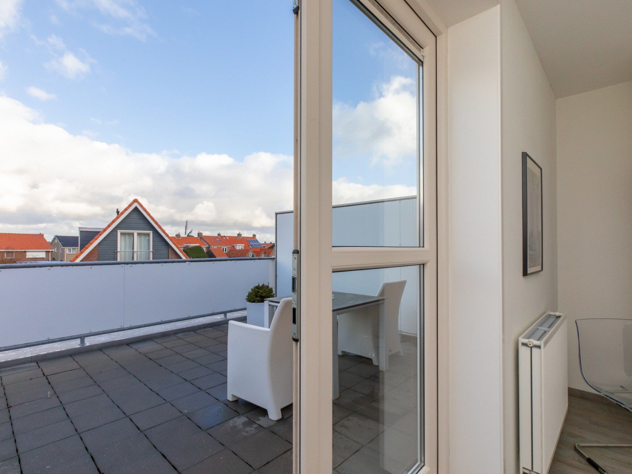 Het terras van Vakantiewoning 't Zoete Licht Residenz - Willibrordusplein 28 C  Zoutelande in Zoutelande