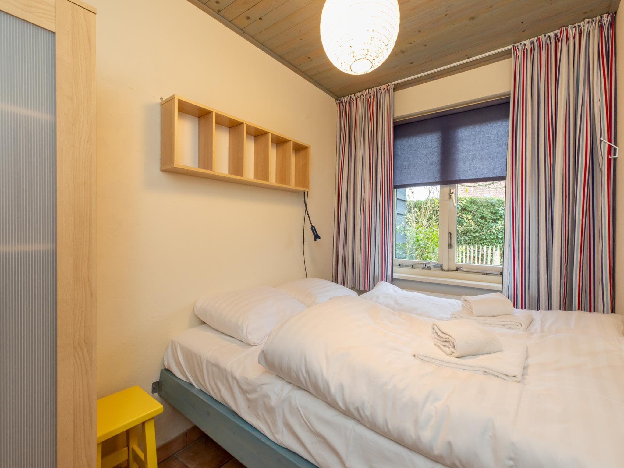 Een slaapkamer van Vakantiehuis voor 6 personen  Hoge Weide 63 Oostkapelle  Dicht bij strand in Oostkapelle