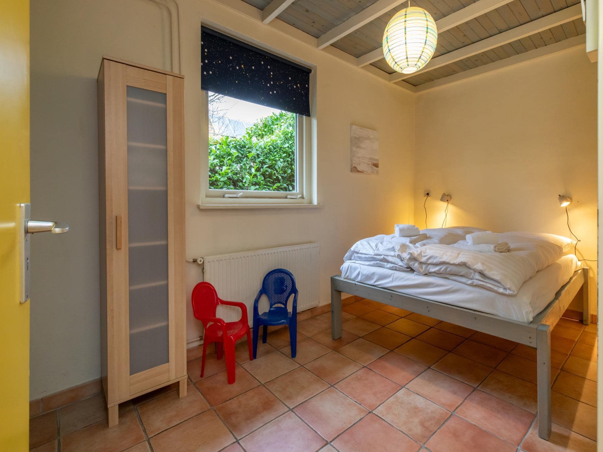 Een slaapkamer van Vakantiehuis voor 6 personen  Hoge Weide 63 Oostkapelle  Dicht bij strand in Oostkapelle
