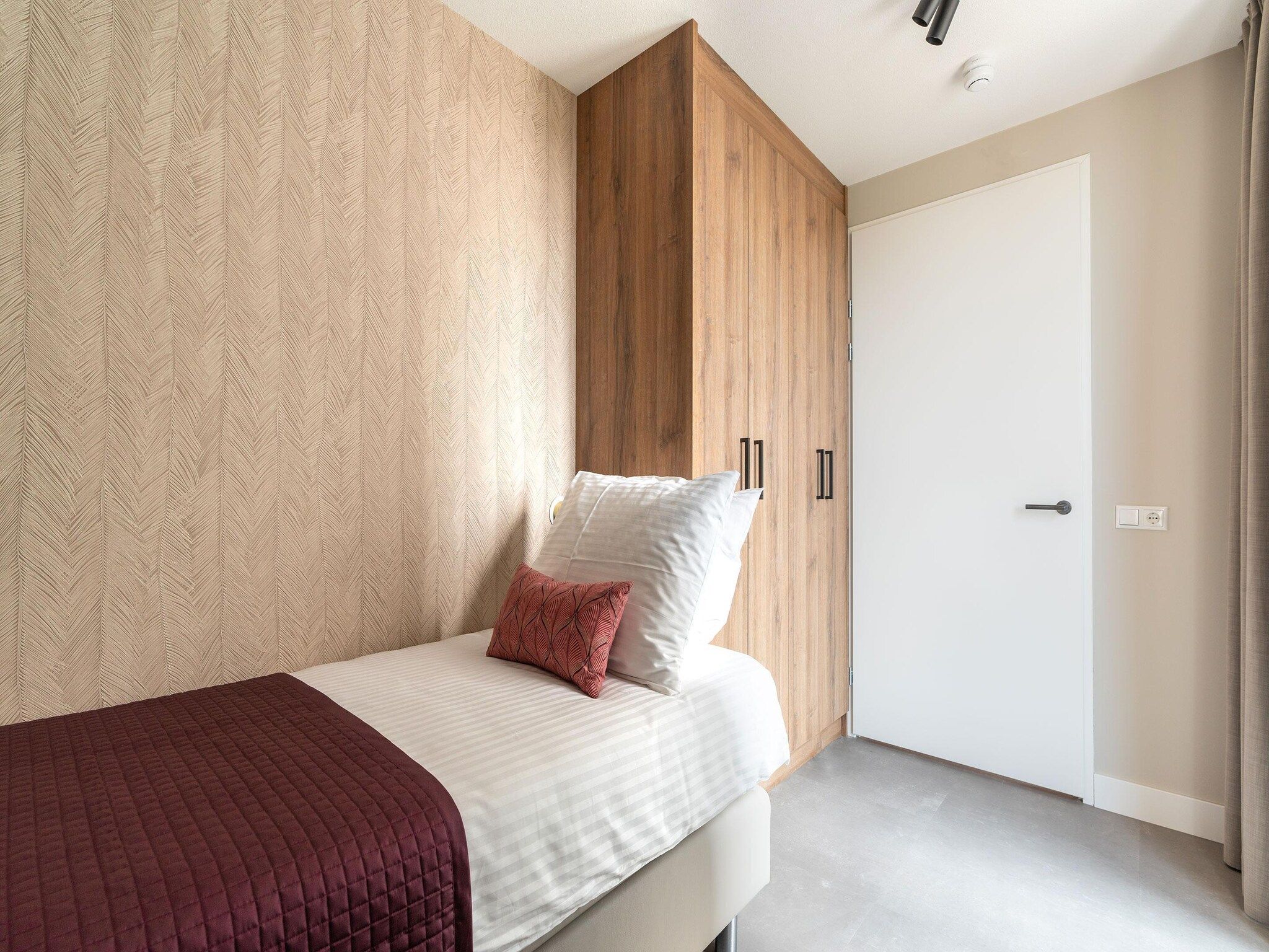 Een slaapkamer van Walden 4 in Den  Haag