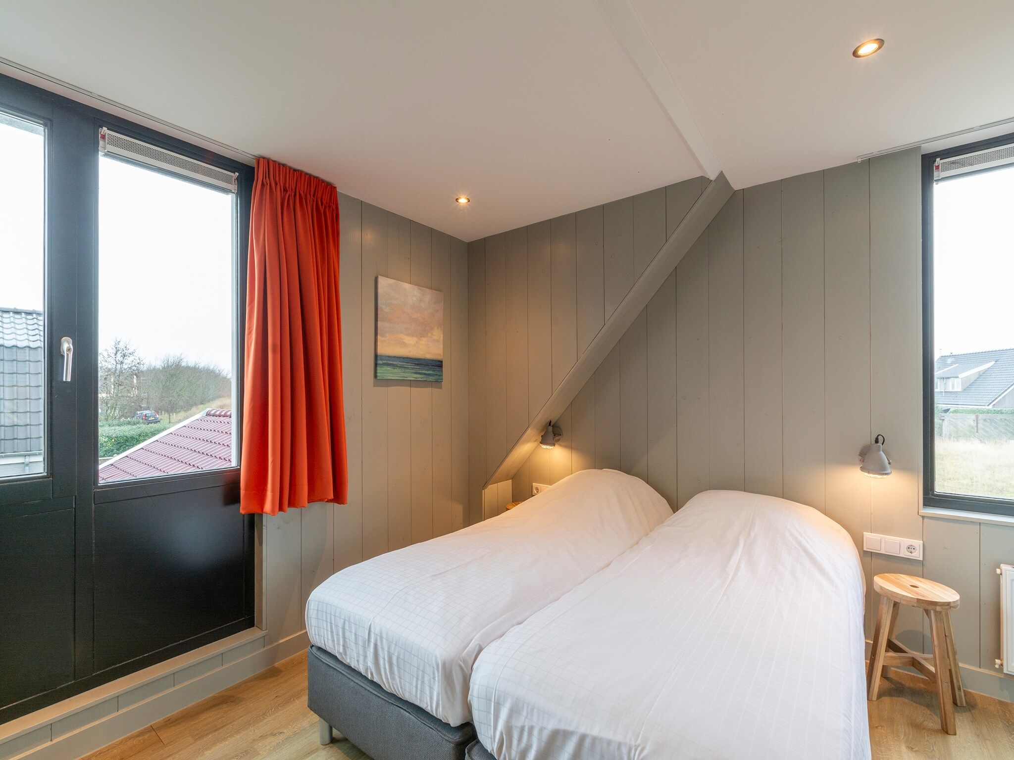 Een slaapkamer van Groote Kaap in Callantsoog