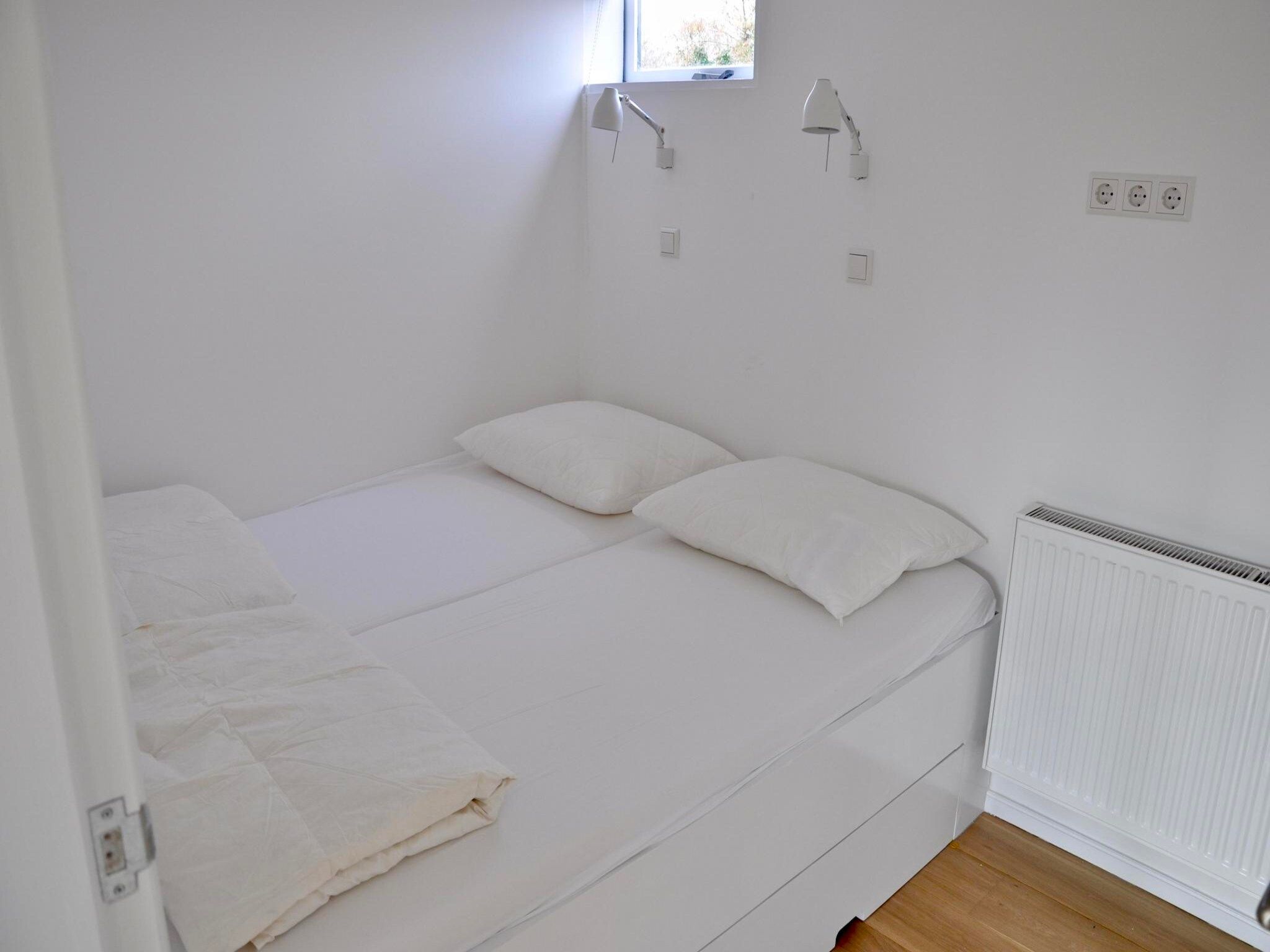 Een slaapkamer van Garnekuul 72 in Callantsoog