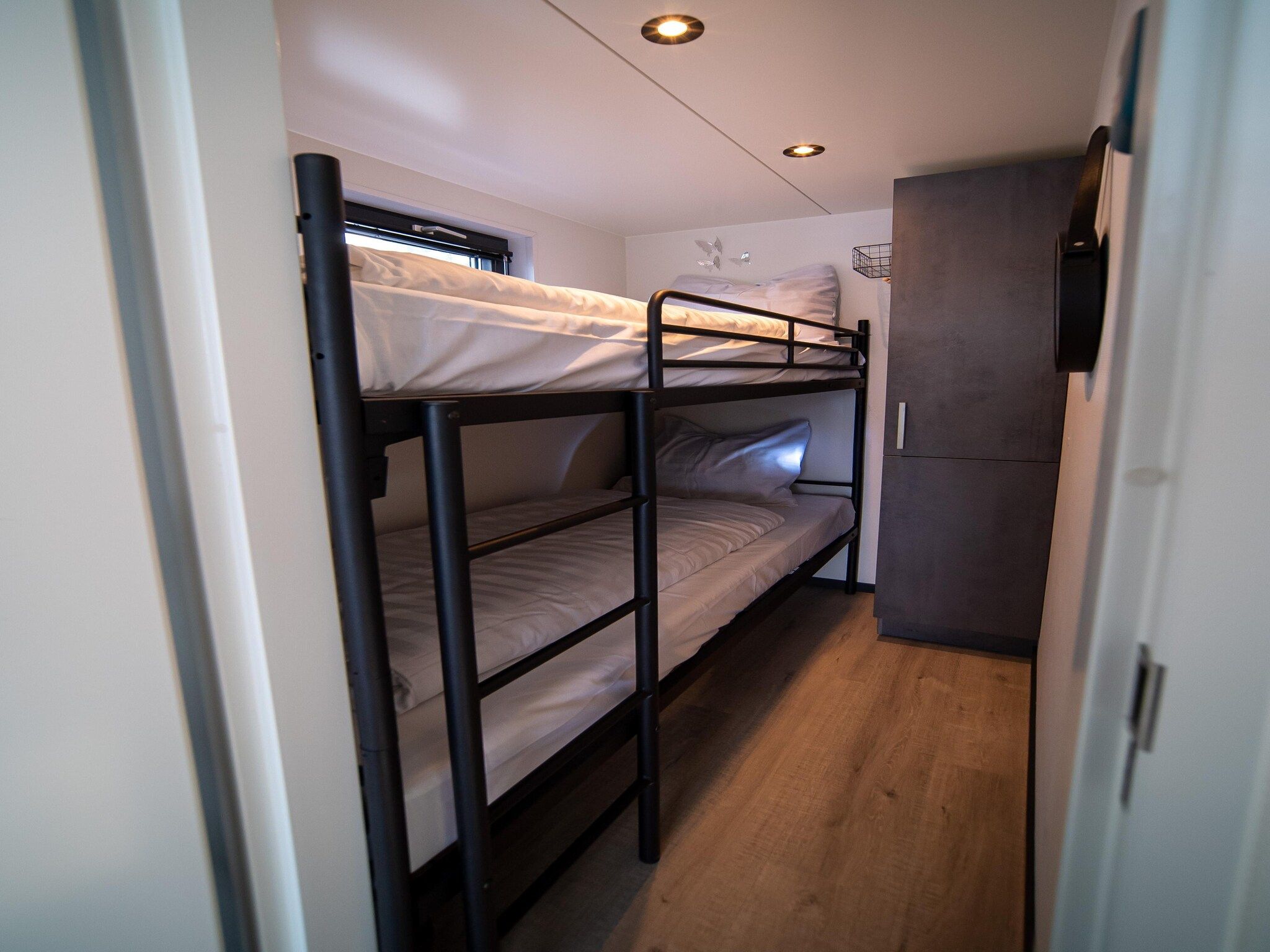 Een slaapkamer van Waterlodges Heeg 1 in Heeg