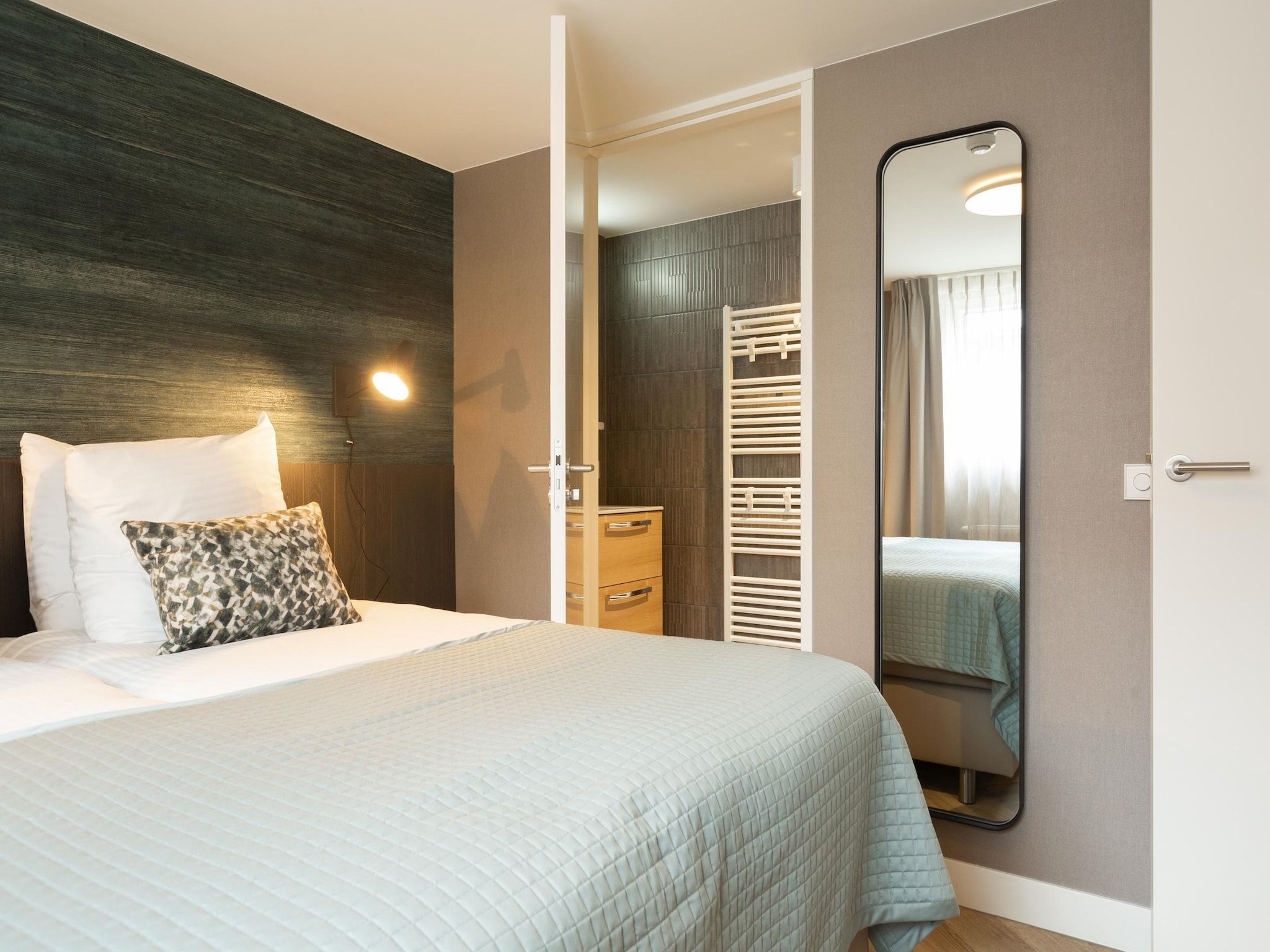 Een slaapkamer van Maurits 2 in Den Haag