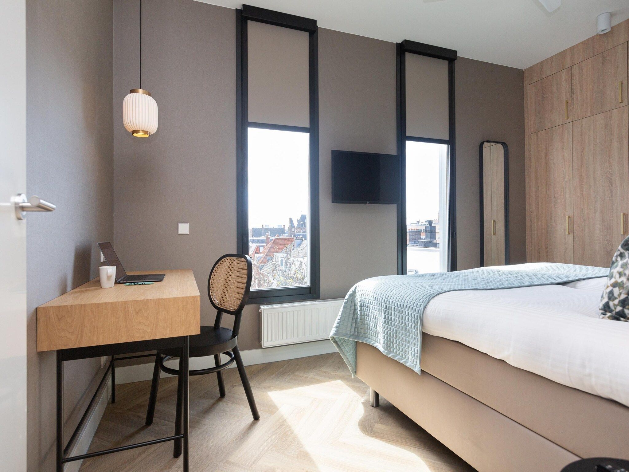Een slaapkamer van Maurits 7 in Den Haag