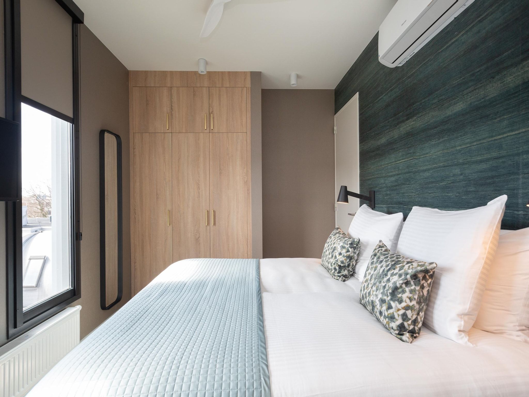 Een slaapkamer van Maurits 7 in Den Haag