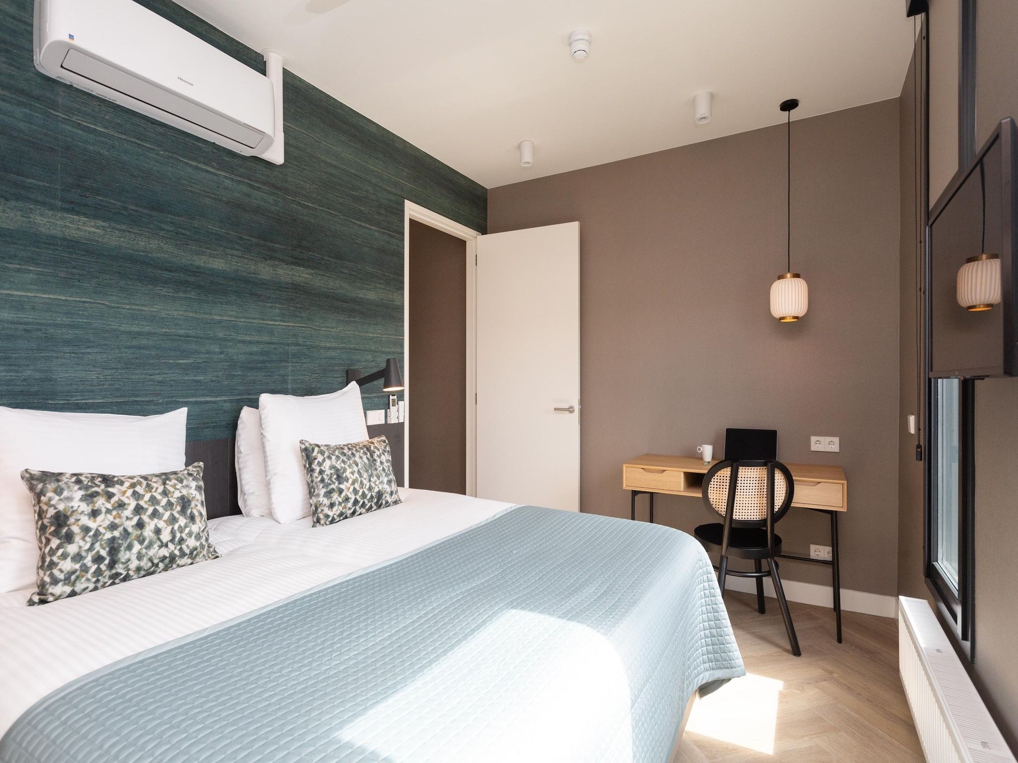 Een slaapkamer van Maurits 7 in Den Haag