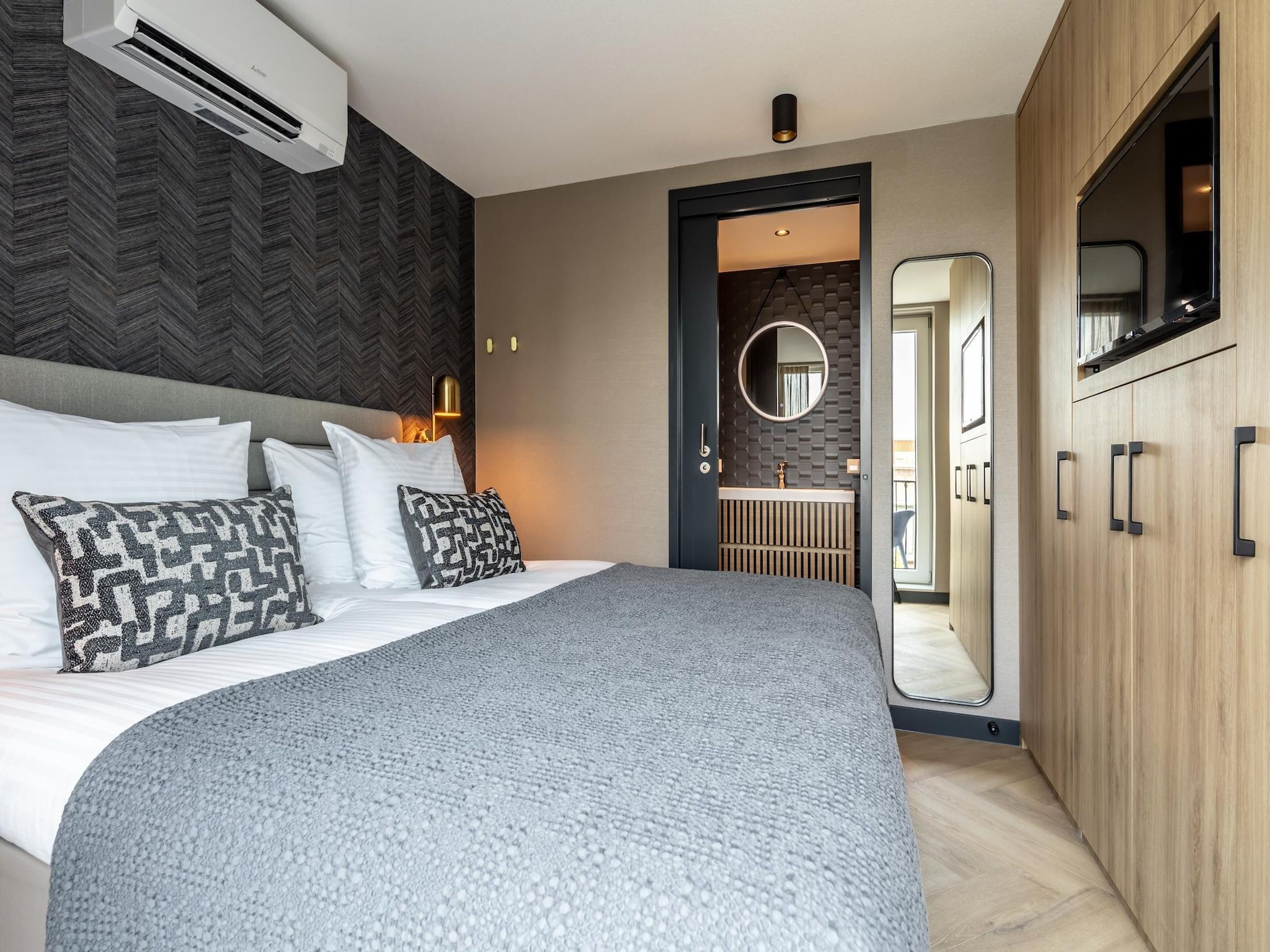 Een slaapkamer van Delft 2B in Delft