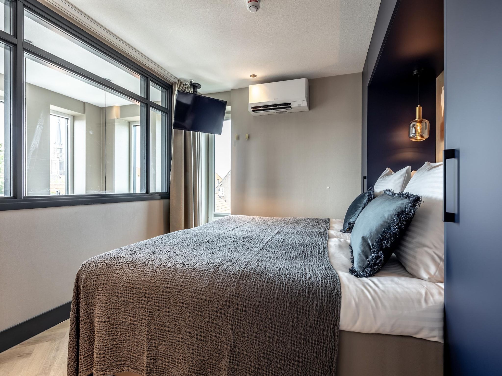 Een slaapkamer van Delft 5A in Delft