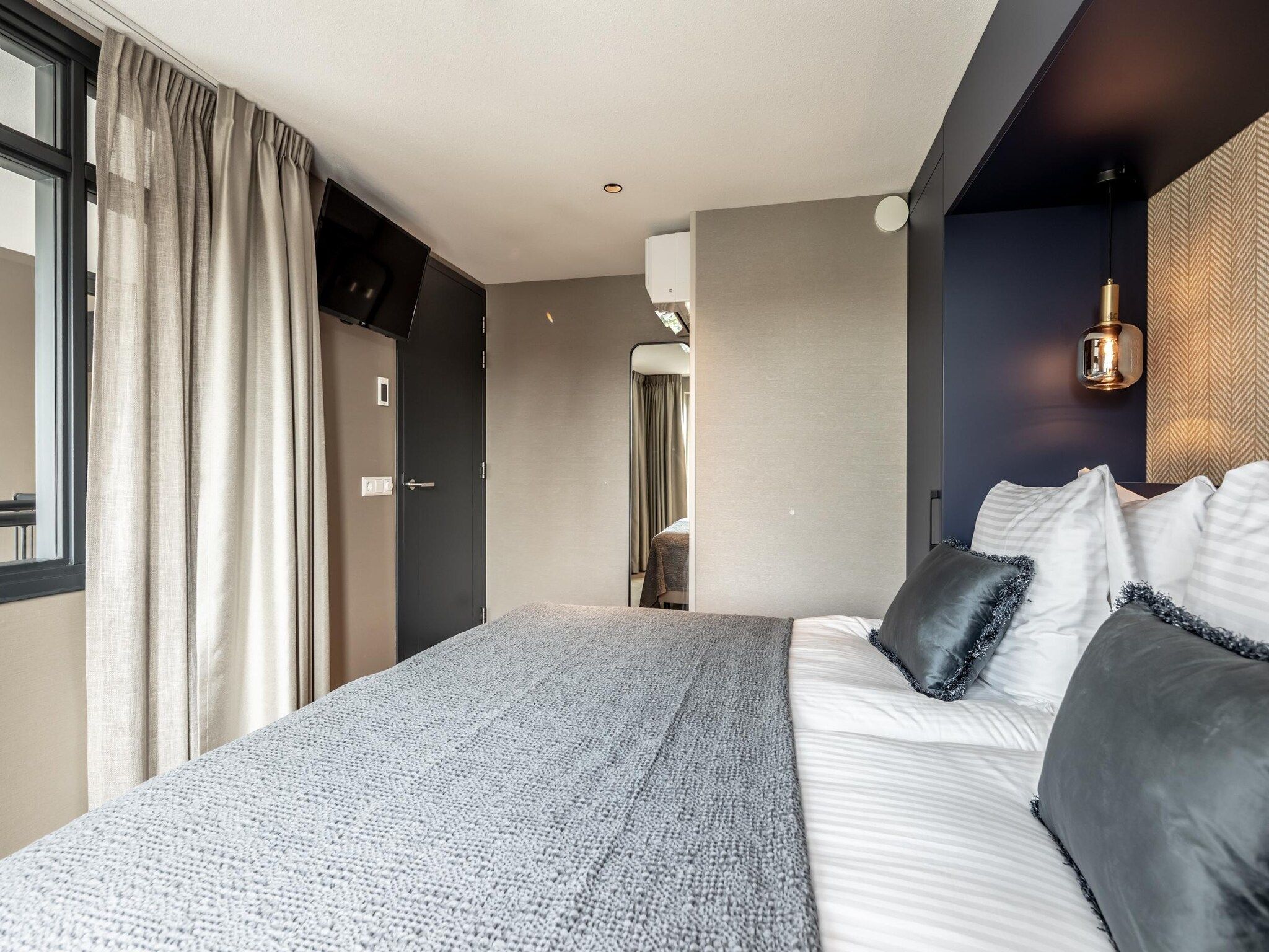 Een slaapkamer van Delft 5A in Delft