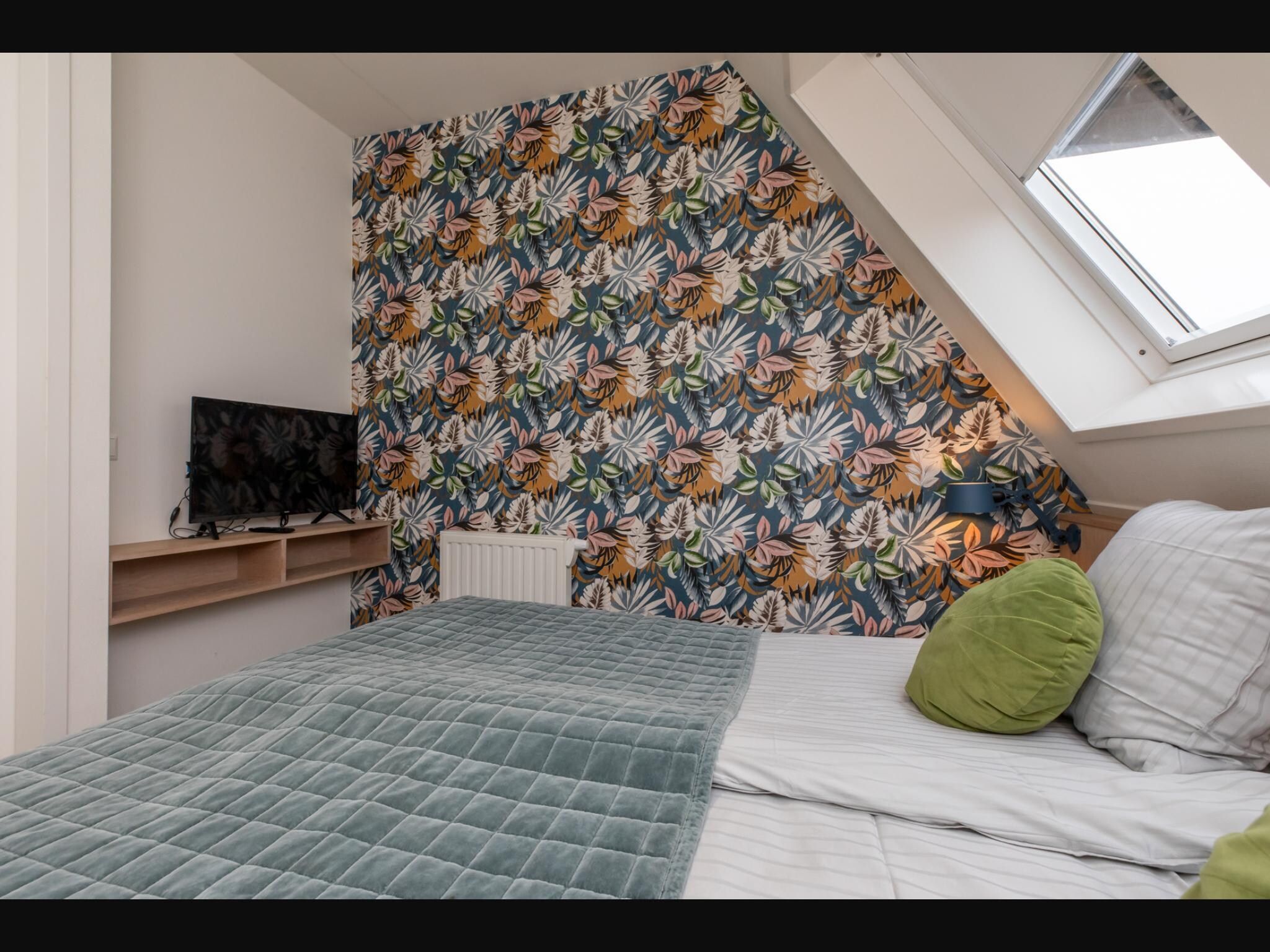 Een slaapkamer van Vakantiehuisje Langstraat 29A Zoutelande 4 Personen  Comfortabel Verblijf in Zoutelande