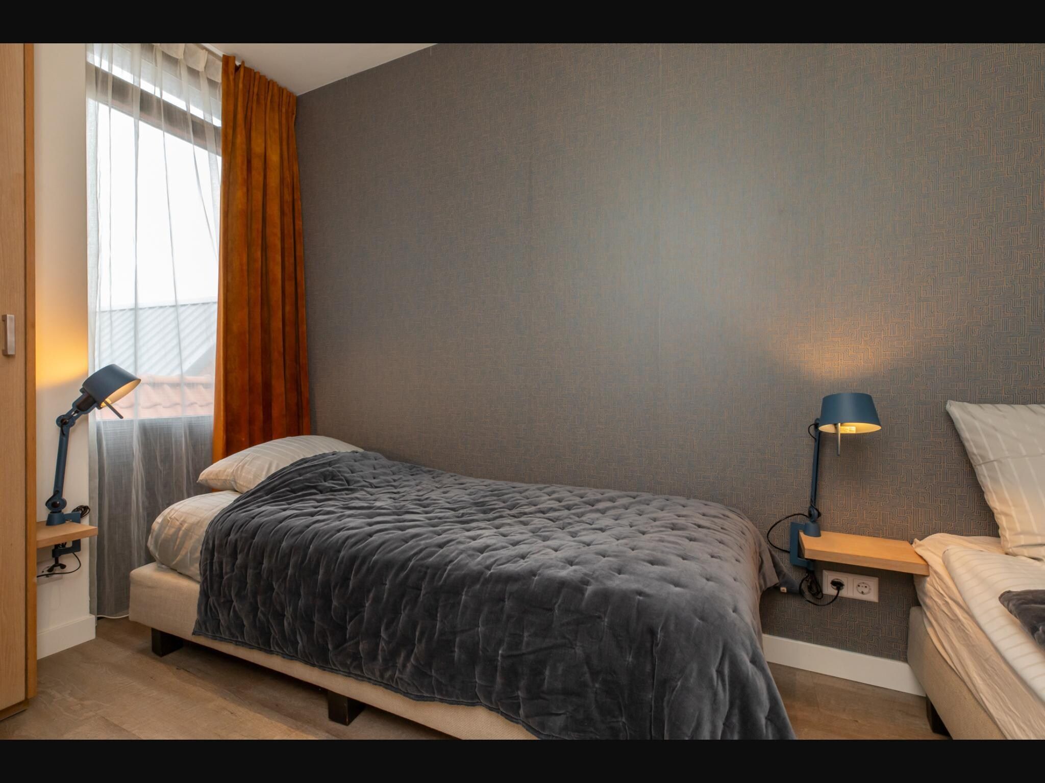 Een slaapkamer van Vakantiehuisje Langstraat 29A Zoutelande 4 Personen  Comfortabel Verblijf in Zoutelande
