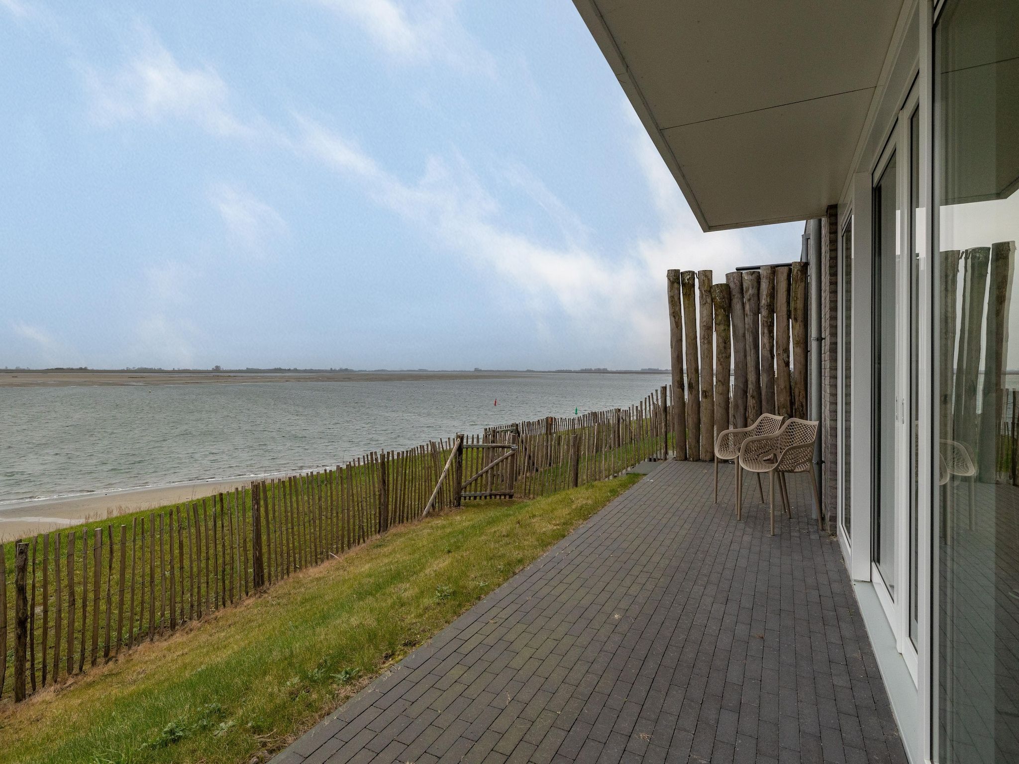 Het uitzicht vanaf Appartement Vista Maris - Havenweg 8-28  Sint-Annaland in Sint-Annaland