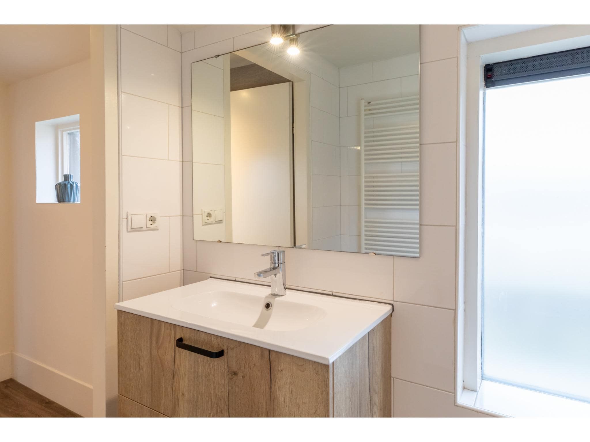 De badkamer van Langstraat 5B in Zoutelande