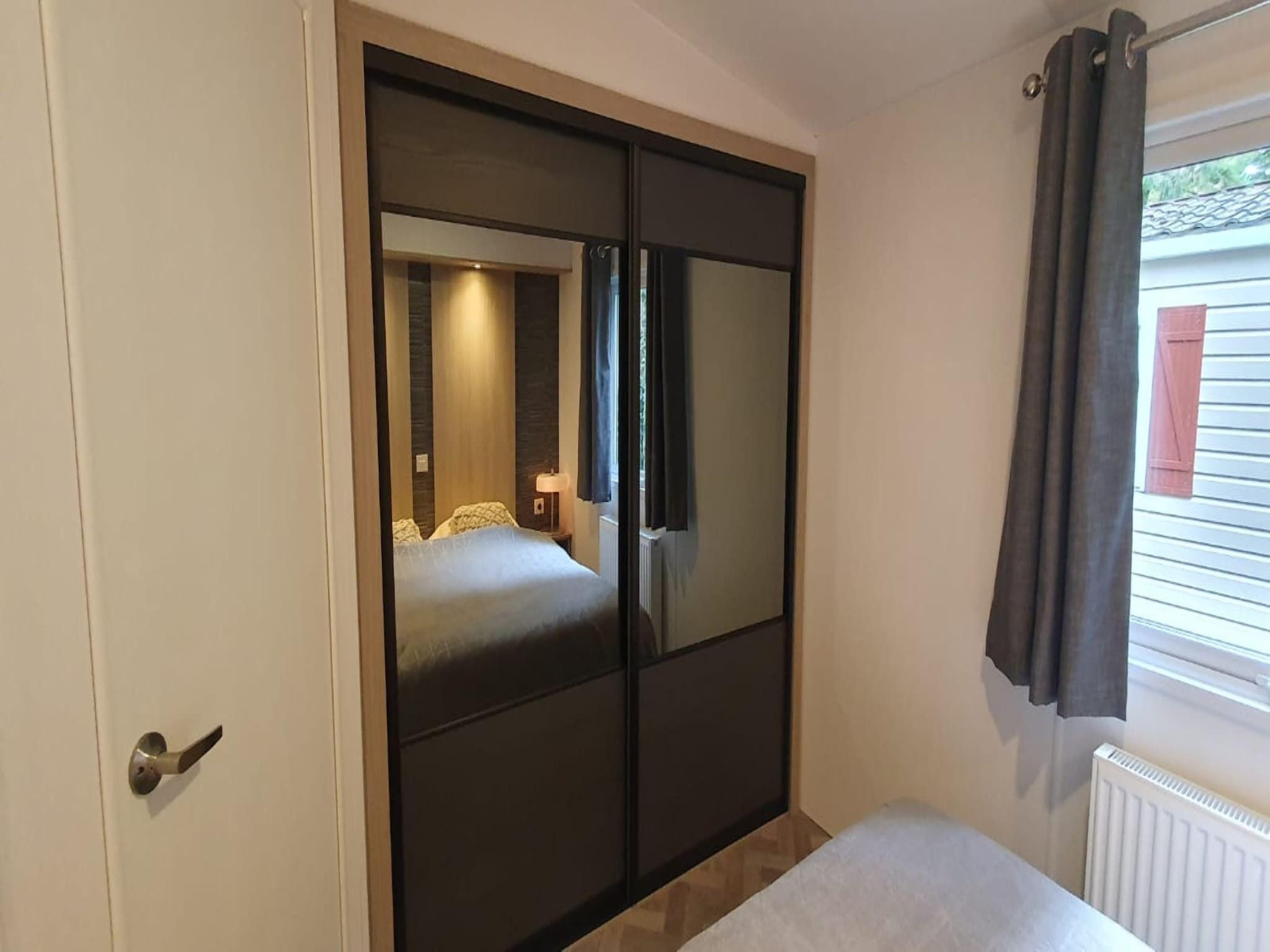 Een slaapkamer van De Parel in Hattemerbroek