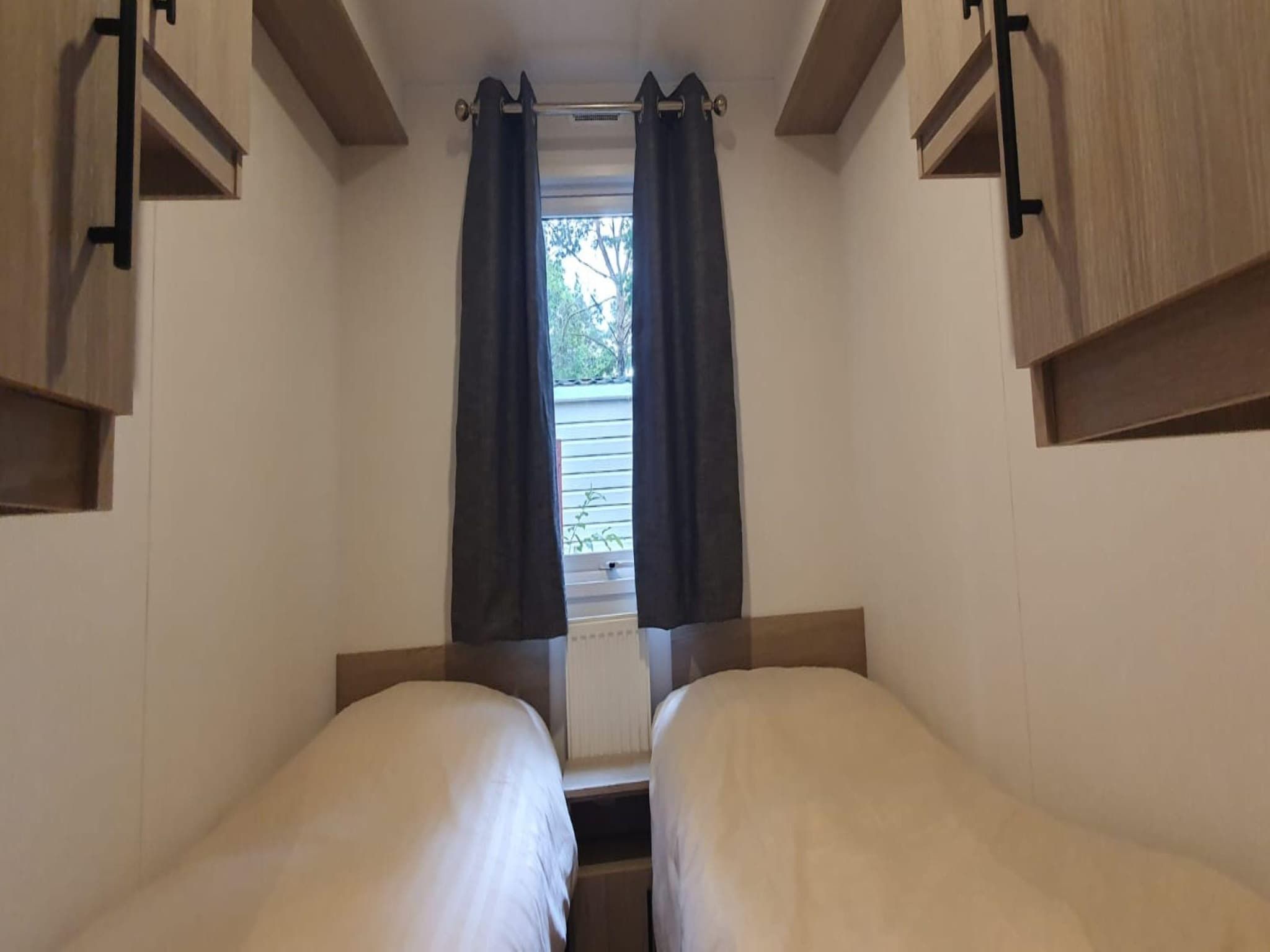 Een slaapkamer van De Parel in Hattemerbroek