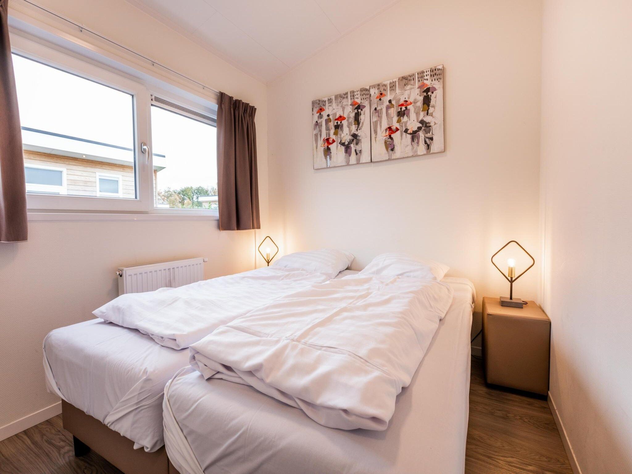 Een slaapkamer van Biebosch - Garden house in Bemelen