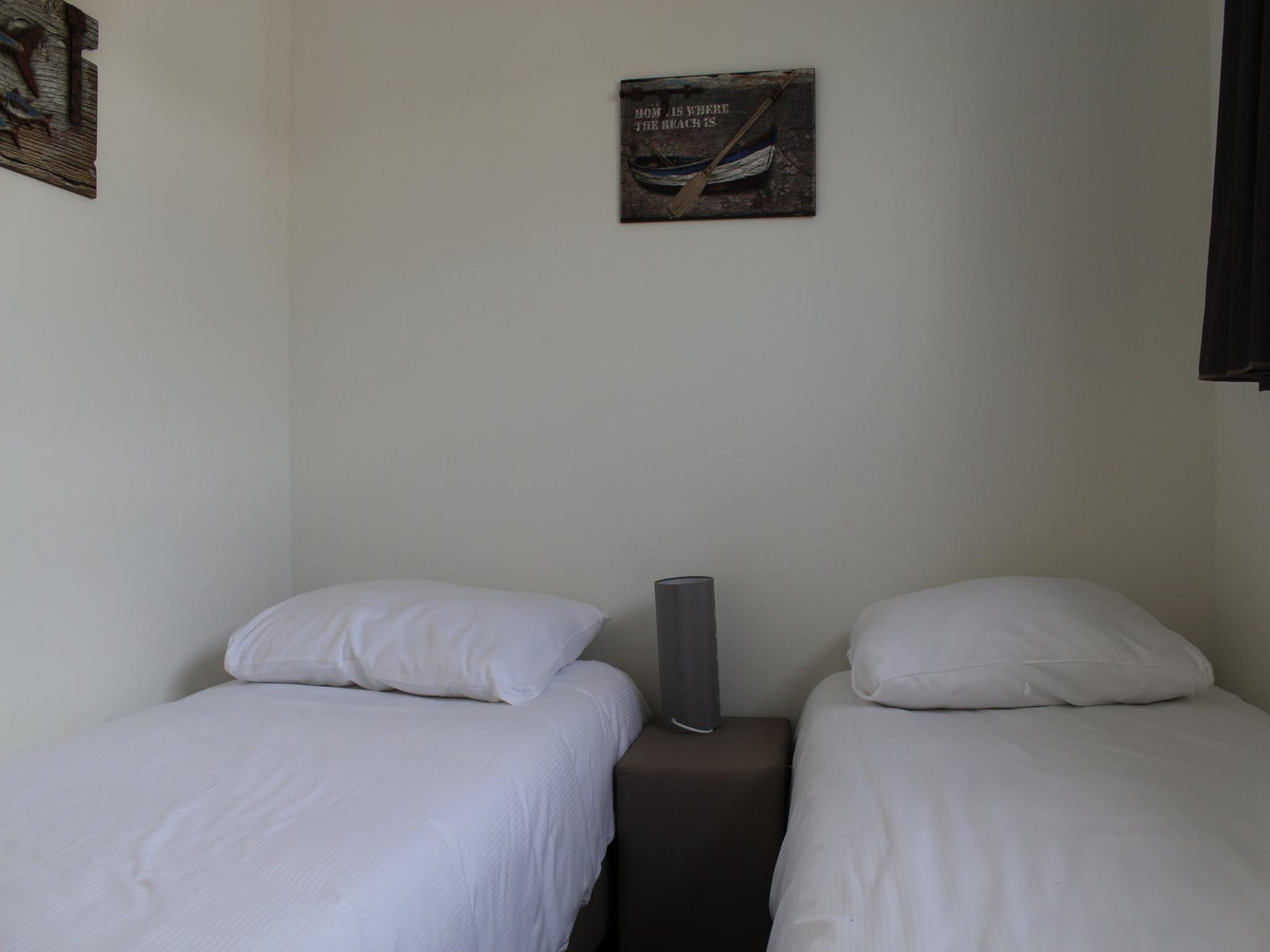 Een slaapkamer van Biebosch - Garden house in Bemelen