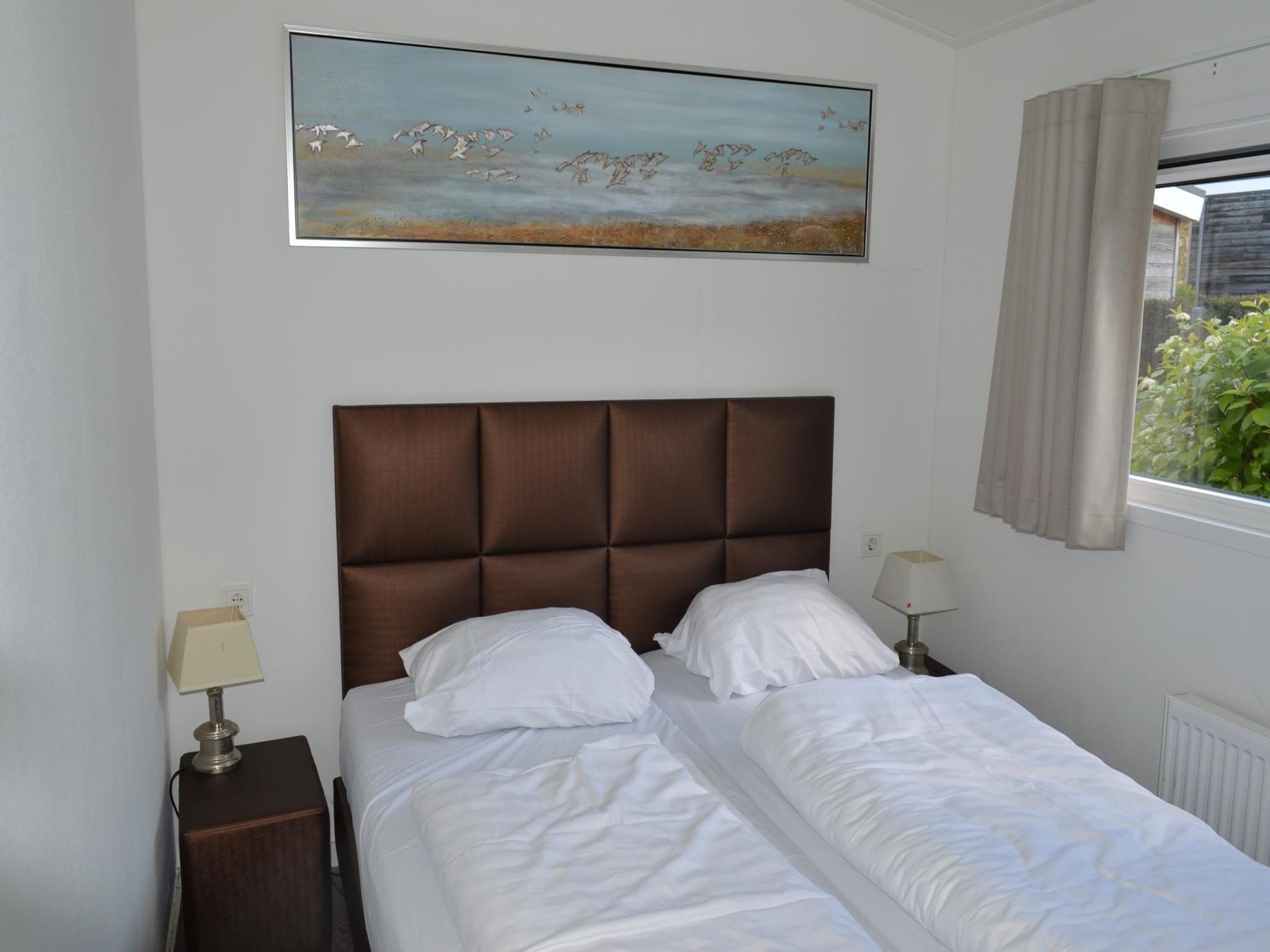 Een slaapkamer van Biebosch - Sunshower in Bemelen