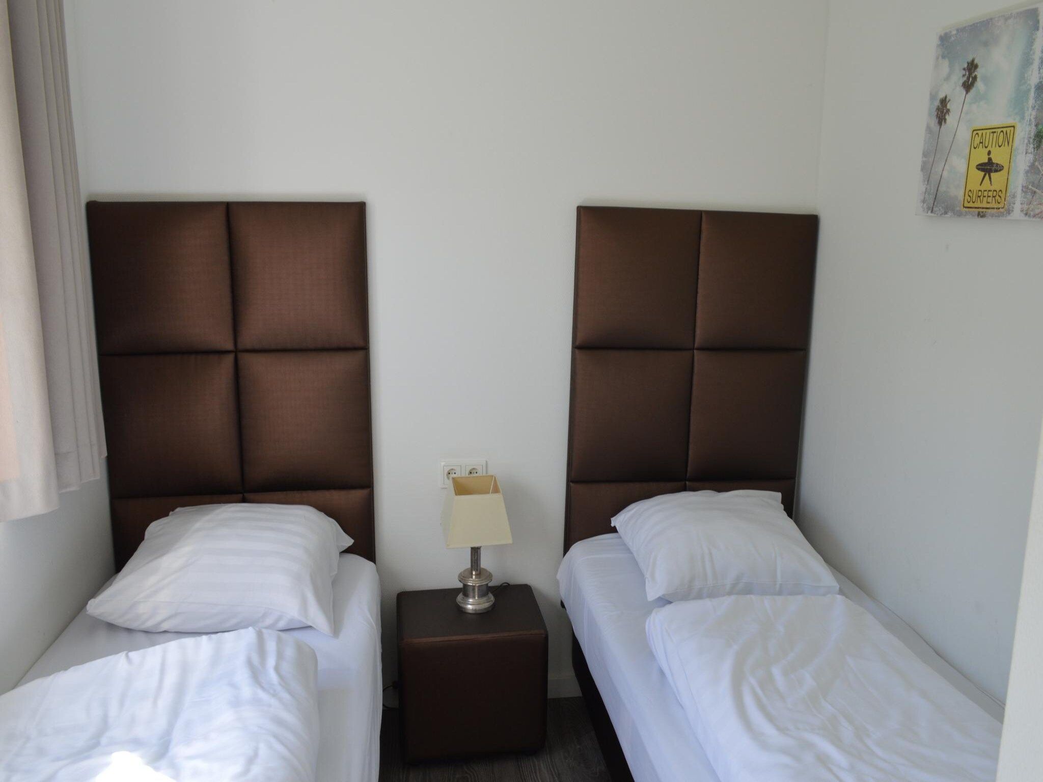 Een slaapkamer van Biebosch - Sunshower in Bemelen