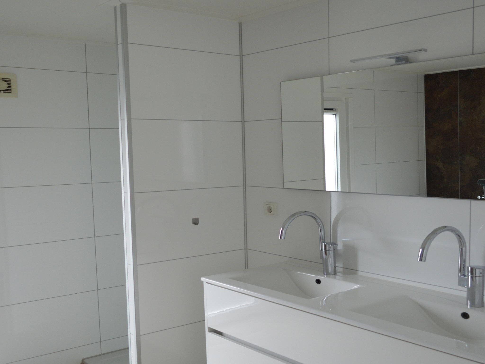 De badkamer van Ravenbosch Royal - Bath & Atmospheric fireplace in Bemelen