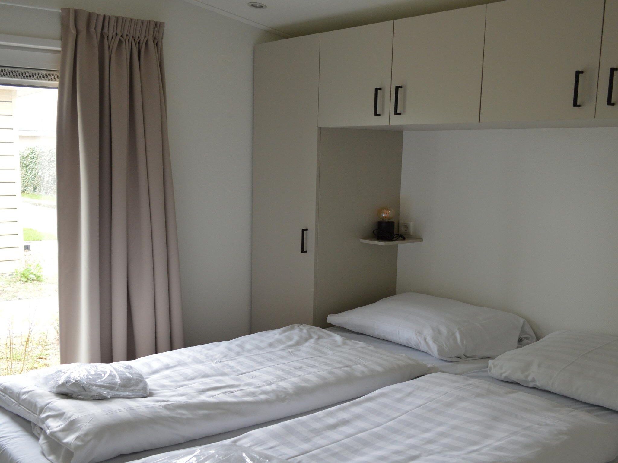 Een slaapkamer van Schaelsbergerbosch Eco - Garden House & Sauna in Bemelen